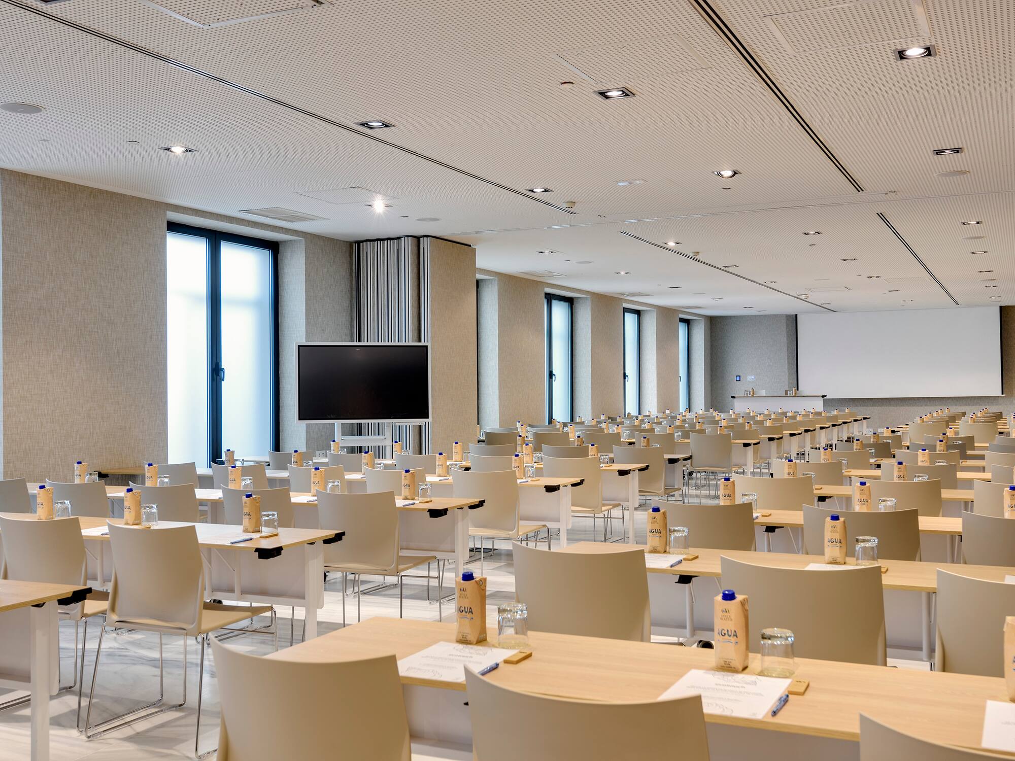 a room with tables and chairs