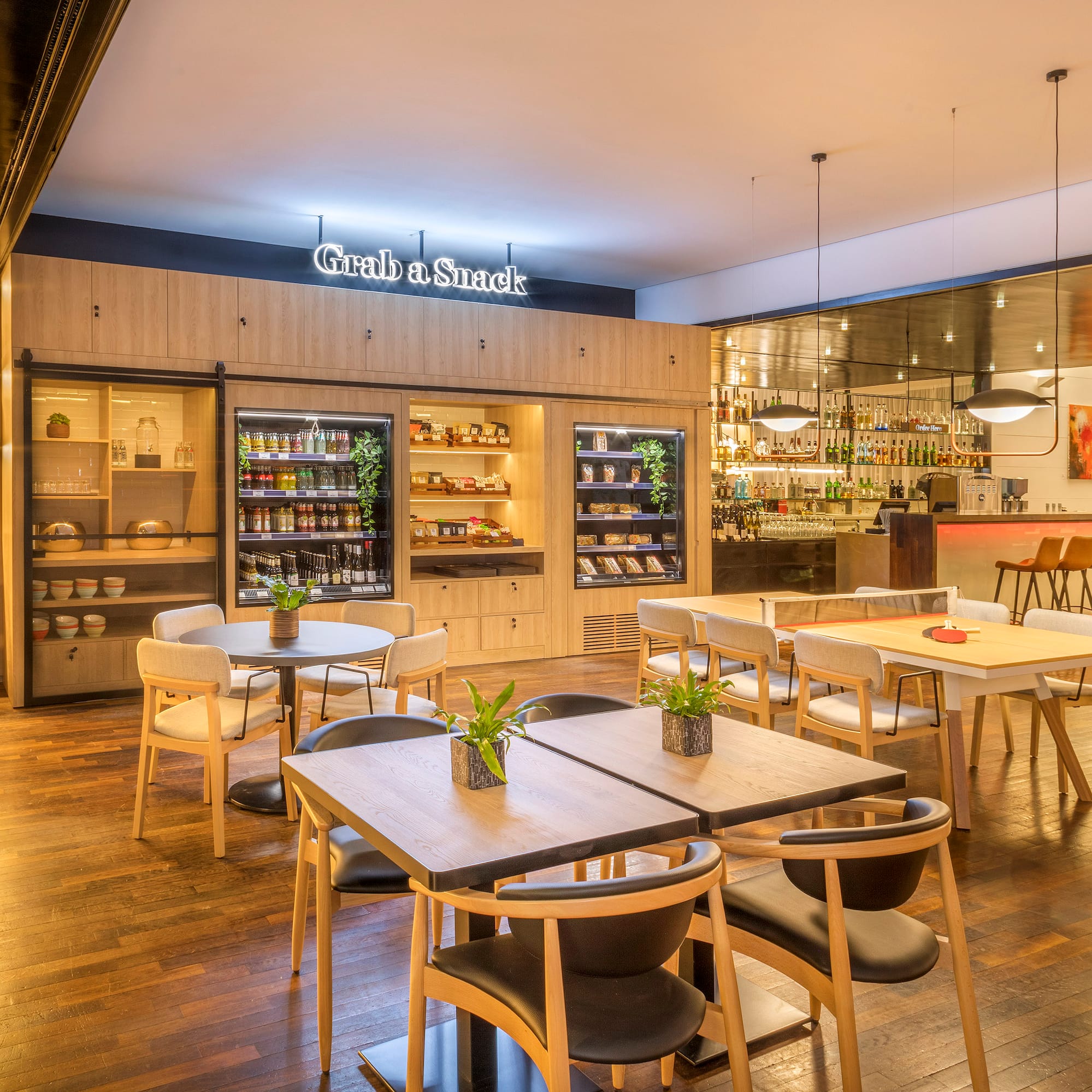 a restaurant with tables and chairs