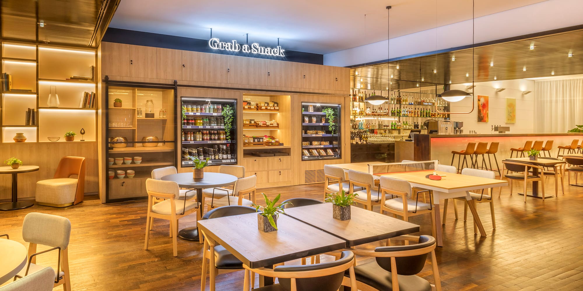 a restaurant with tables and chairs