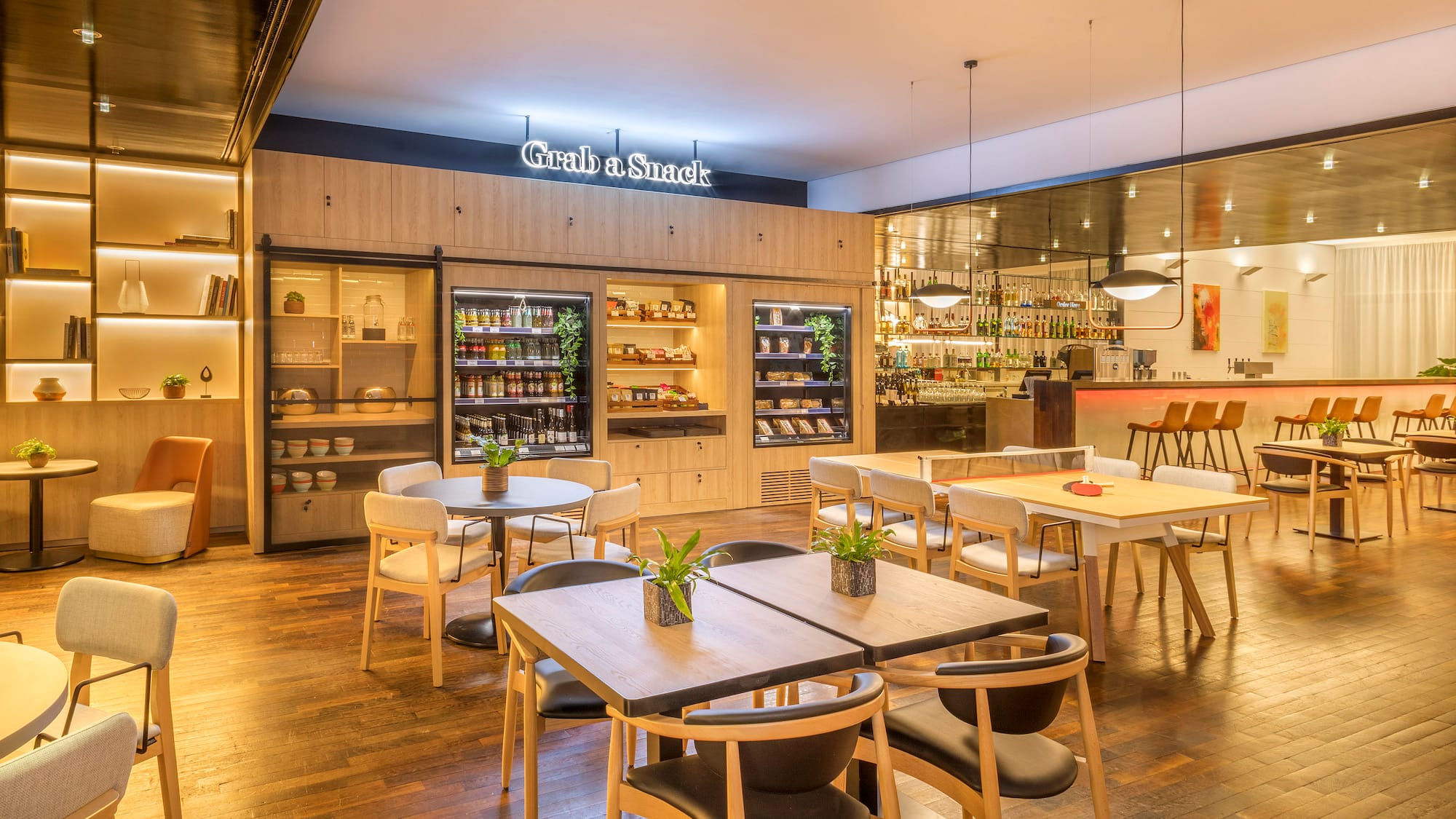 a restaurant with tables and chairs