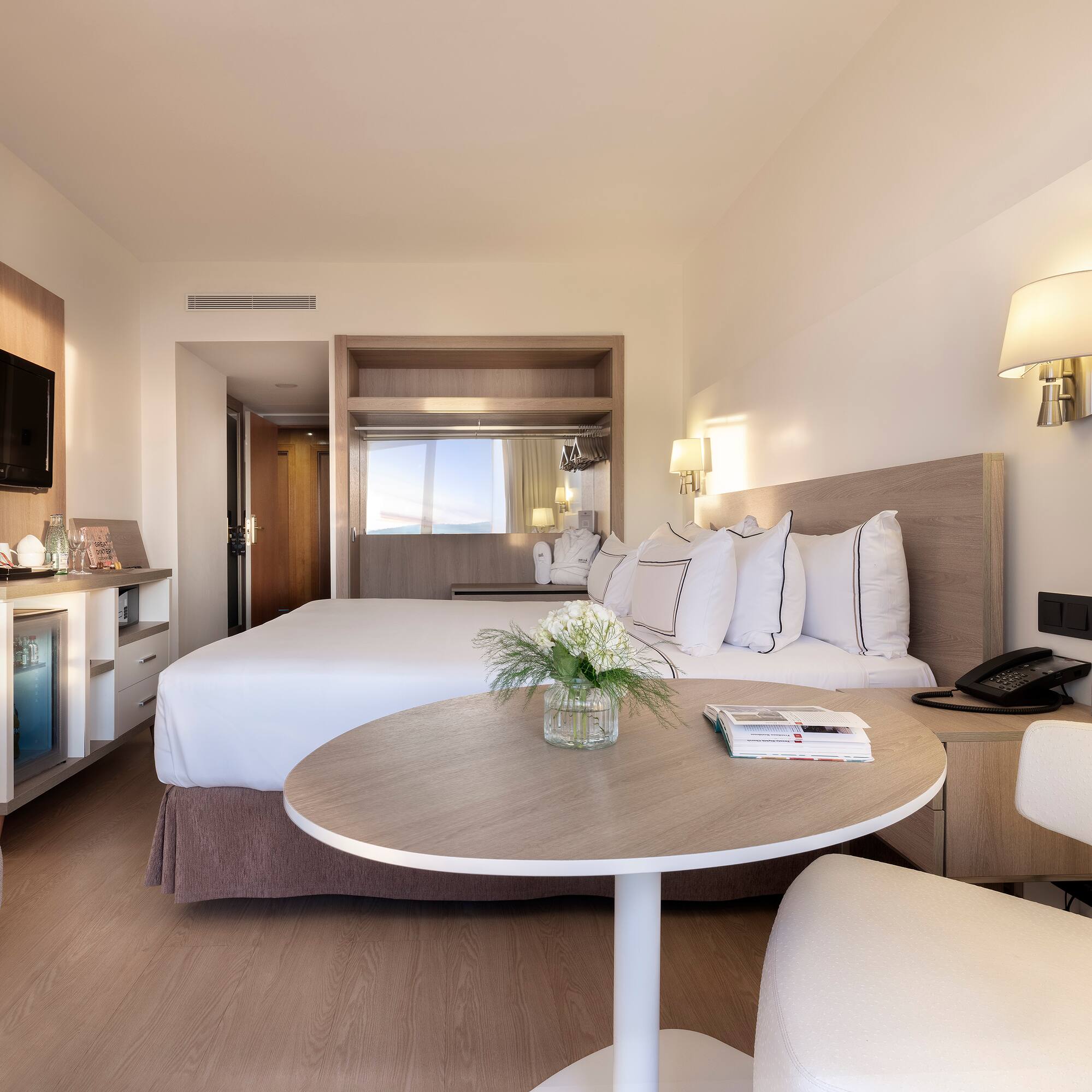 a room with a bed and a table