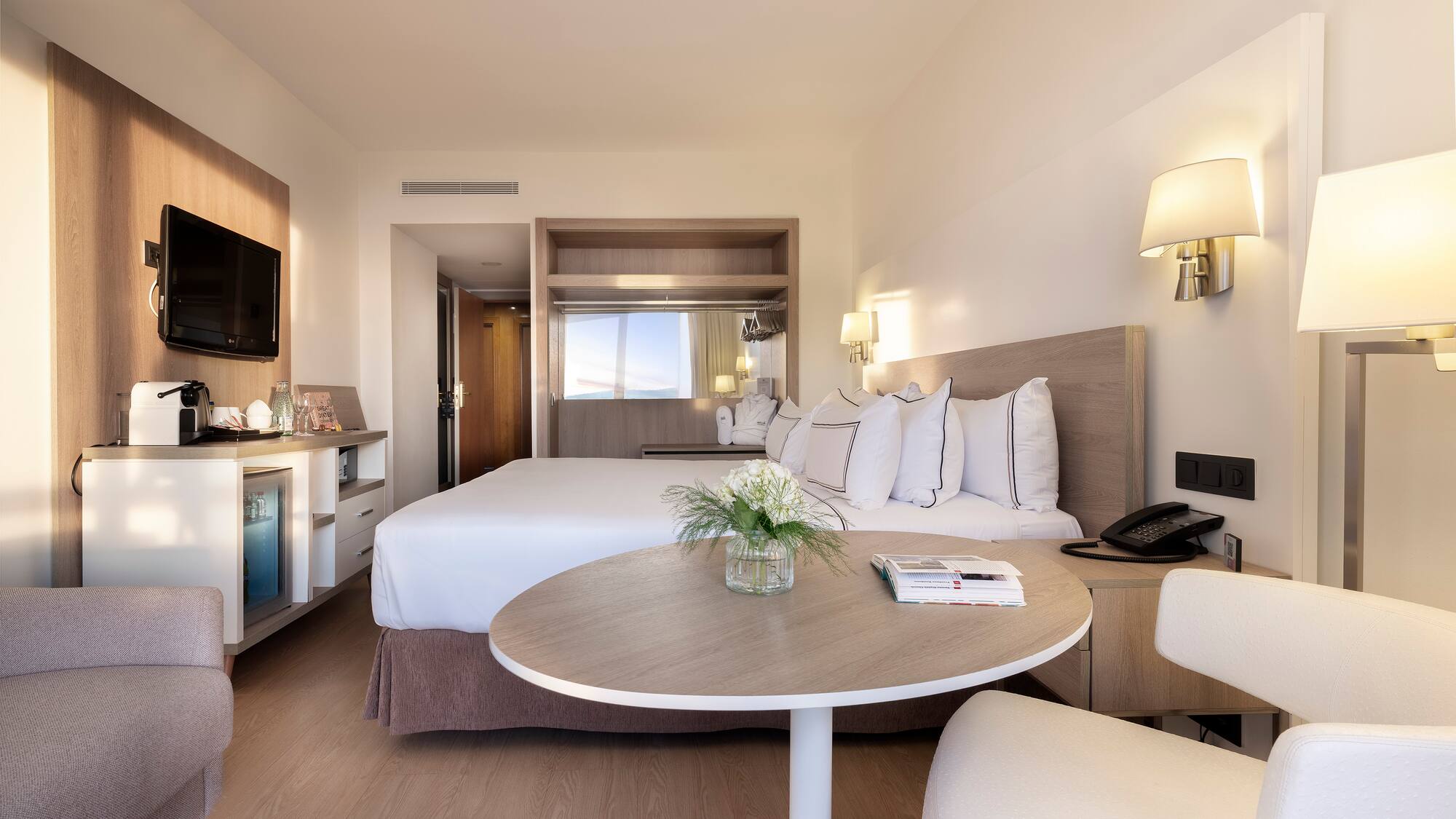 a room with a bed and a table