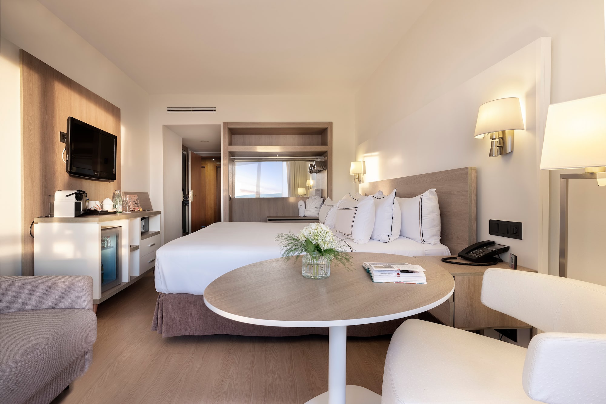 a room with a bed and a table