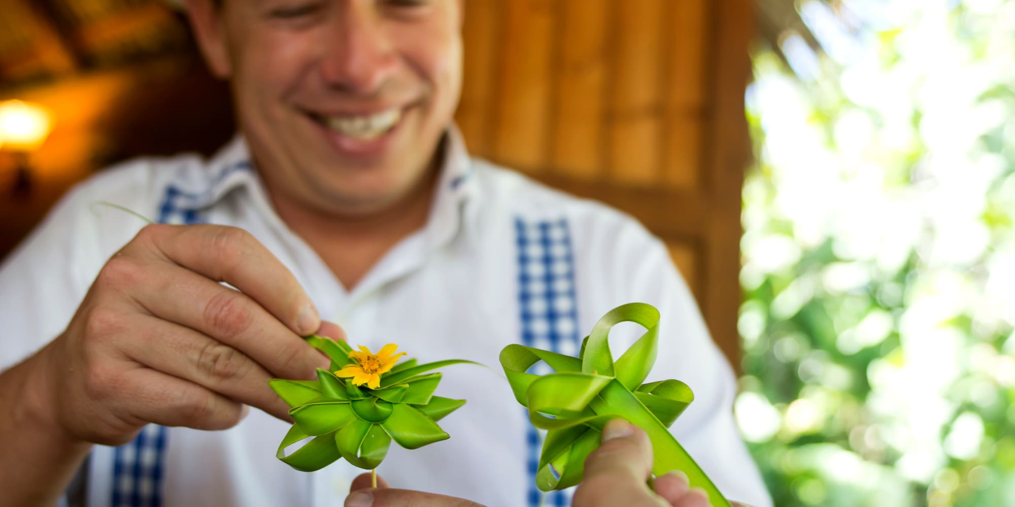 a man holding a flower