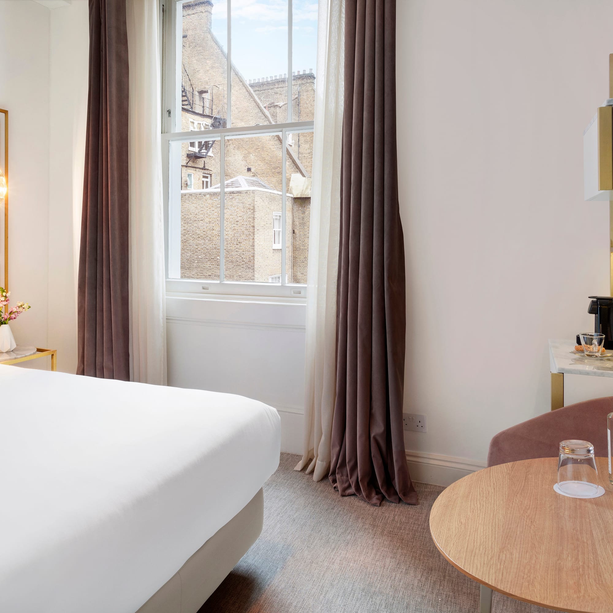 a room with a bed and a table