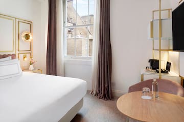 a room with a bed and a table