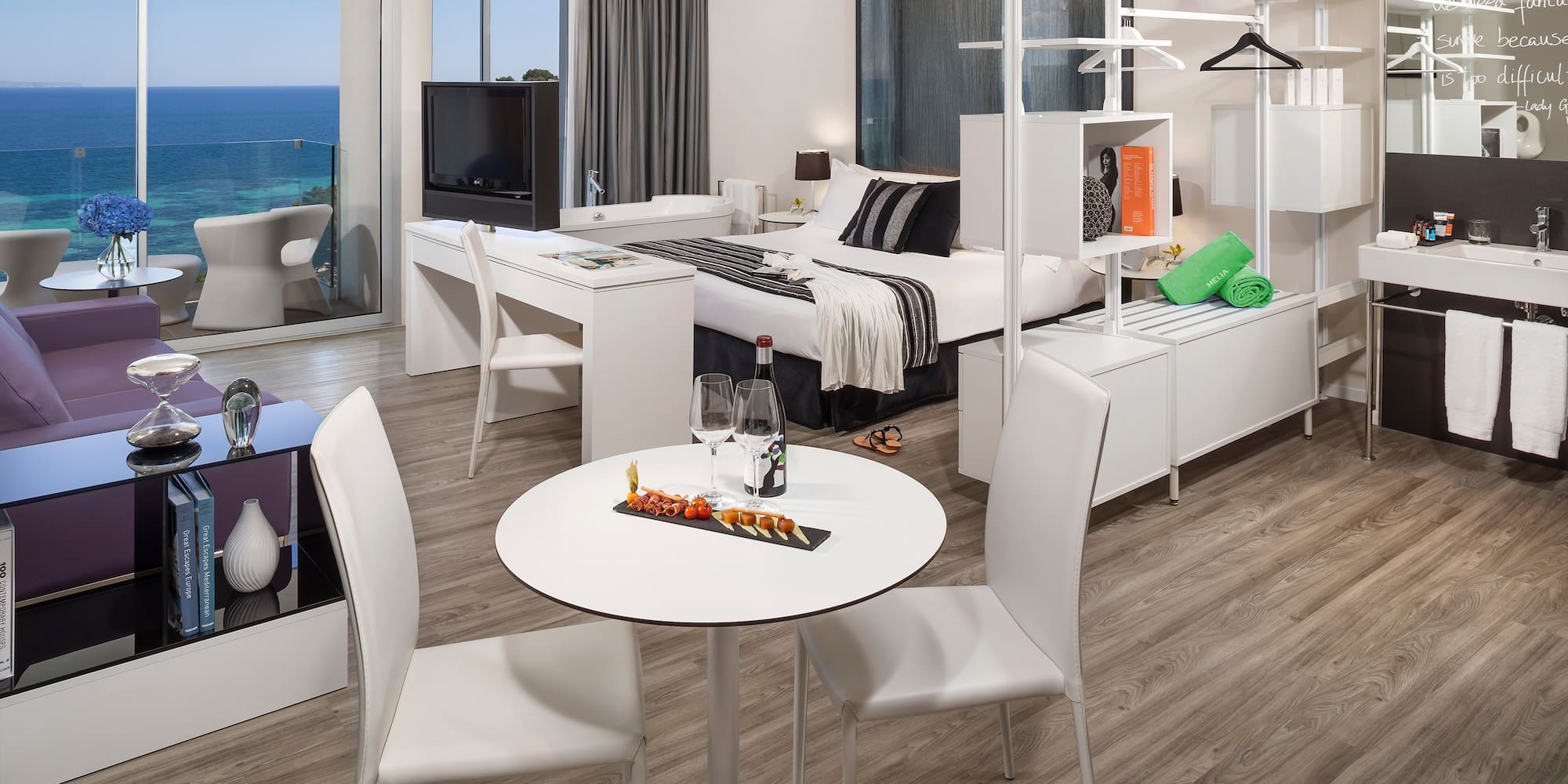 a room with a bed and a table