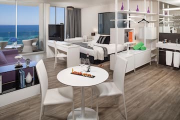 a room with a bed and a table