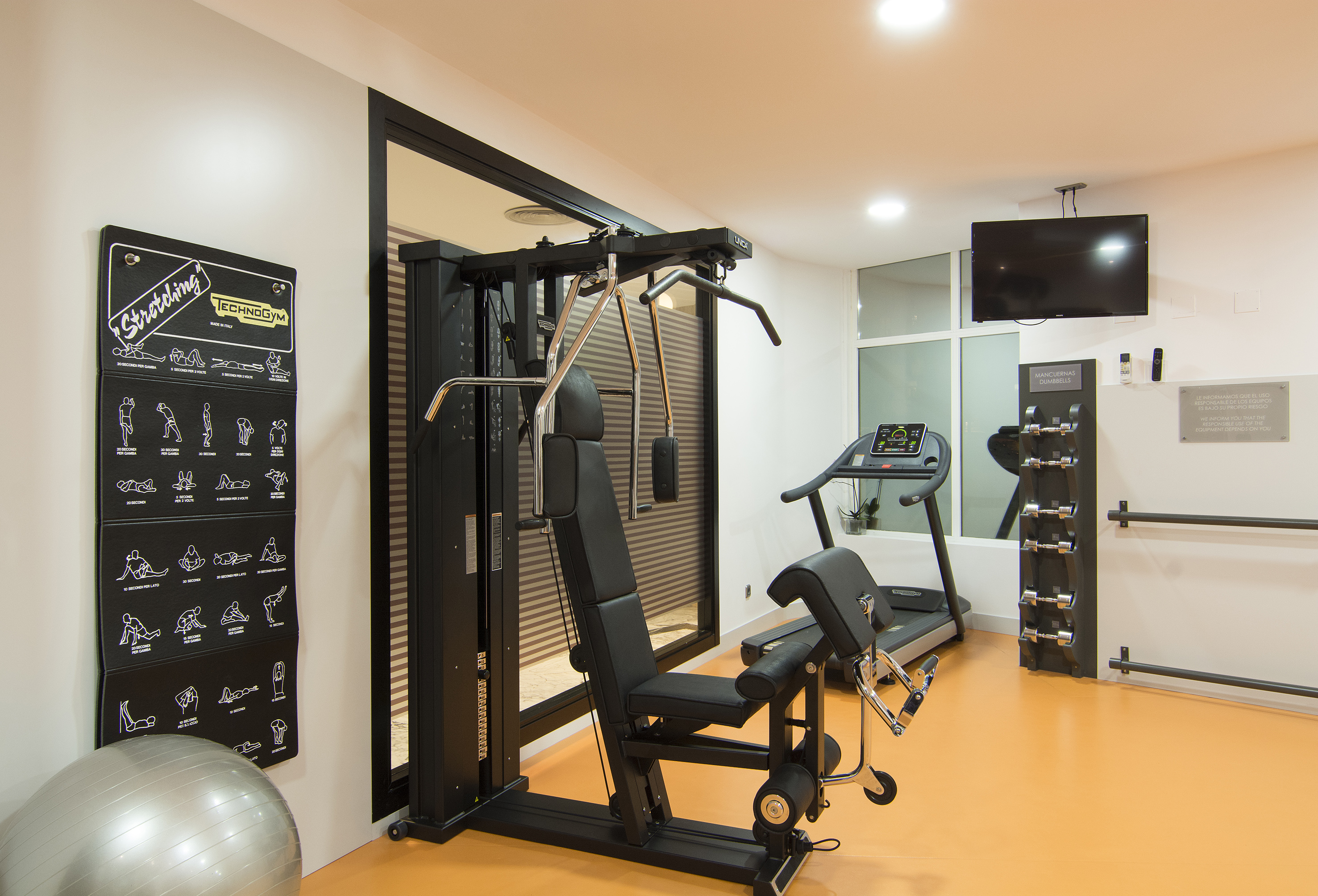 a gym with exercise equipment
