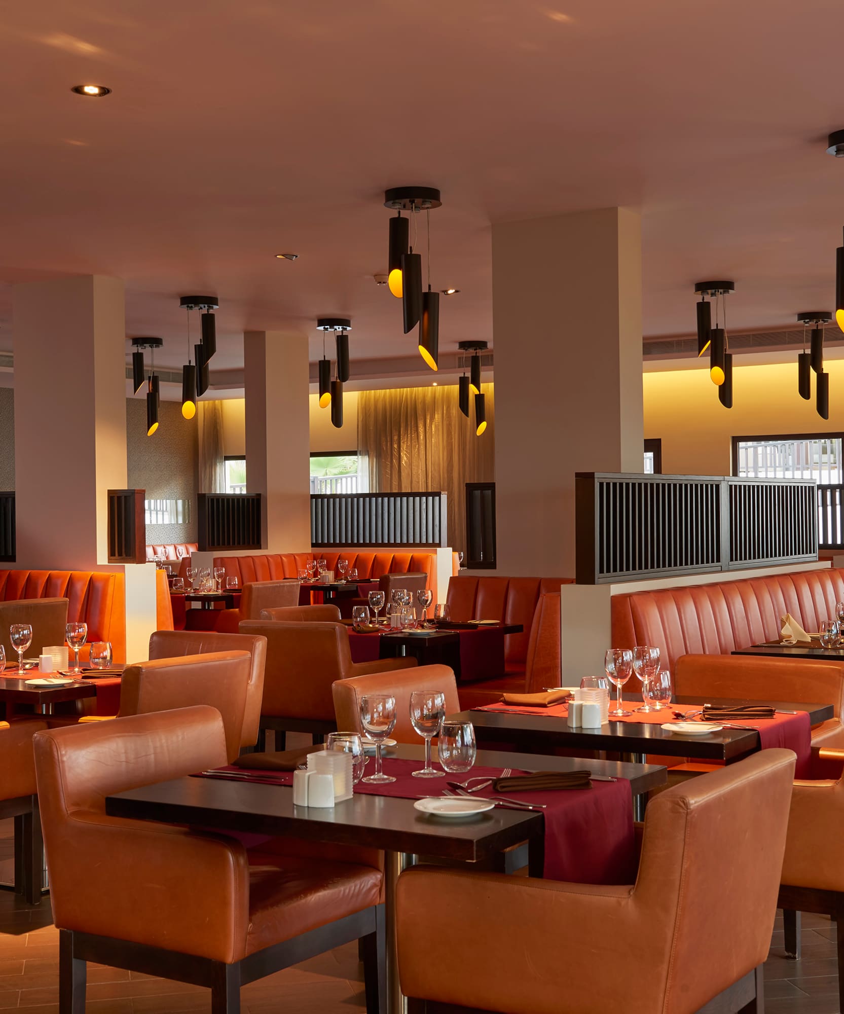 a restaurant with tables and chairs