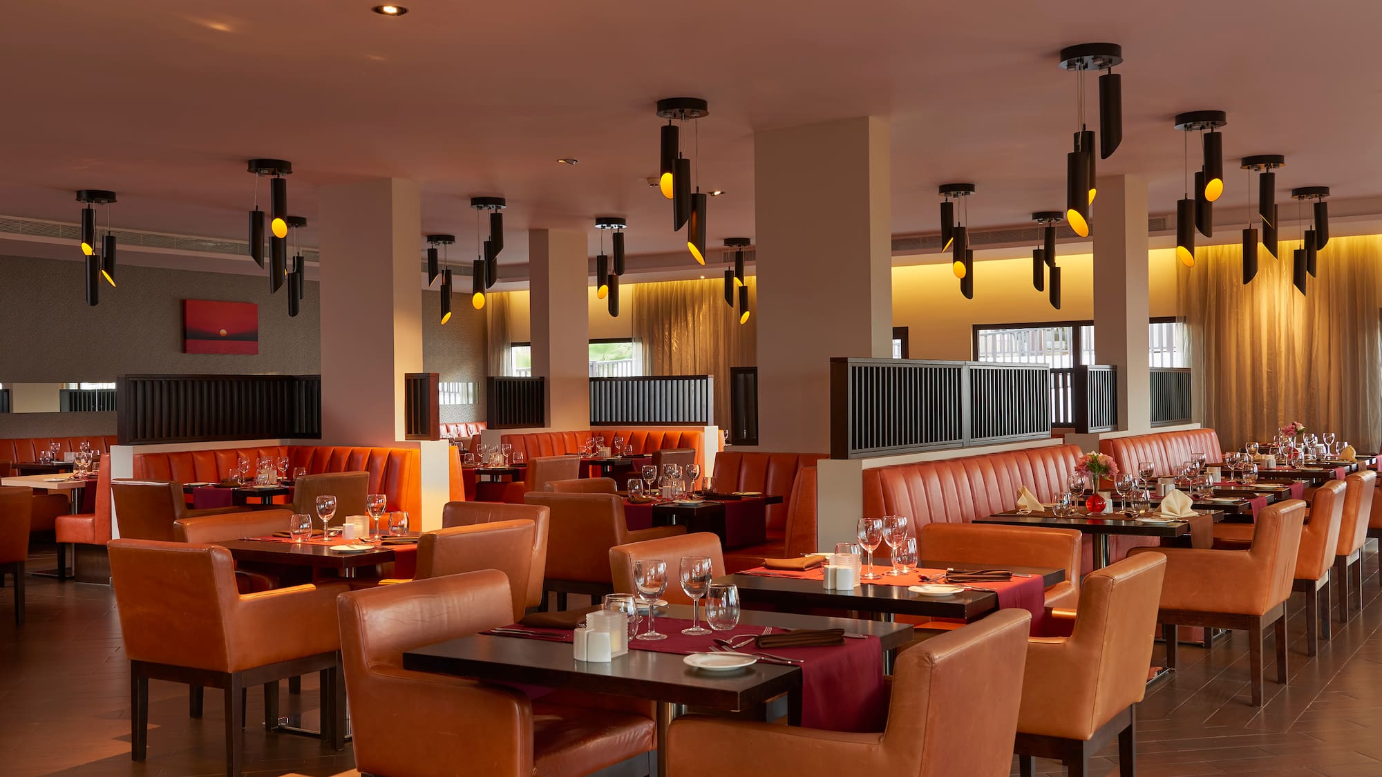 a restaurant with tables and chairs