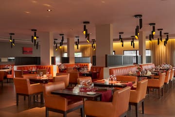 a restaurant with tables and chairs