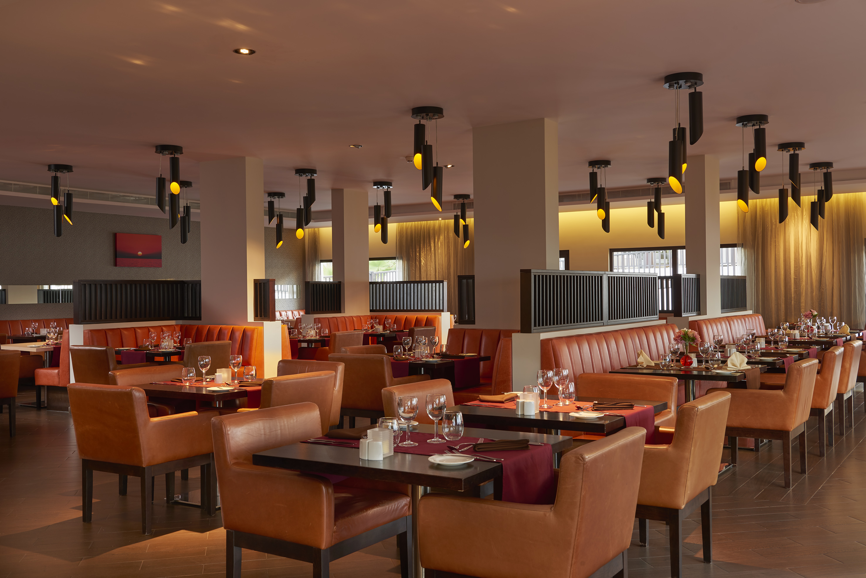 a restaurant with tables and chairs