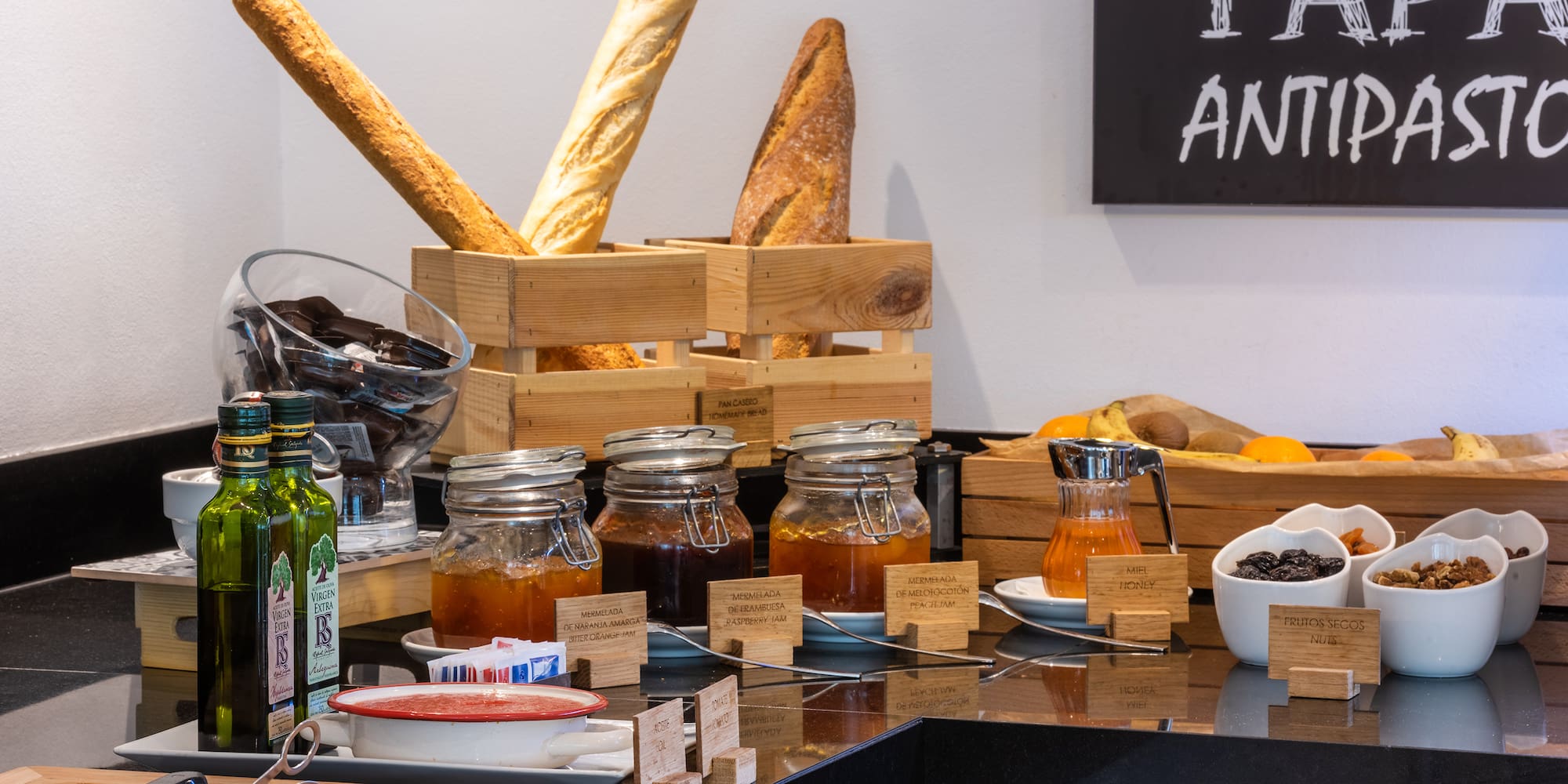 a counter with food and drinks on it