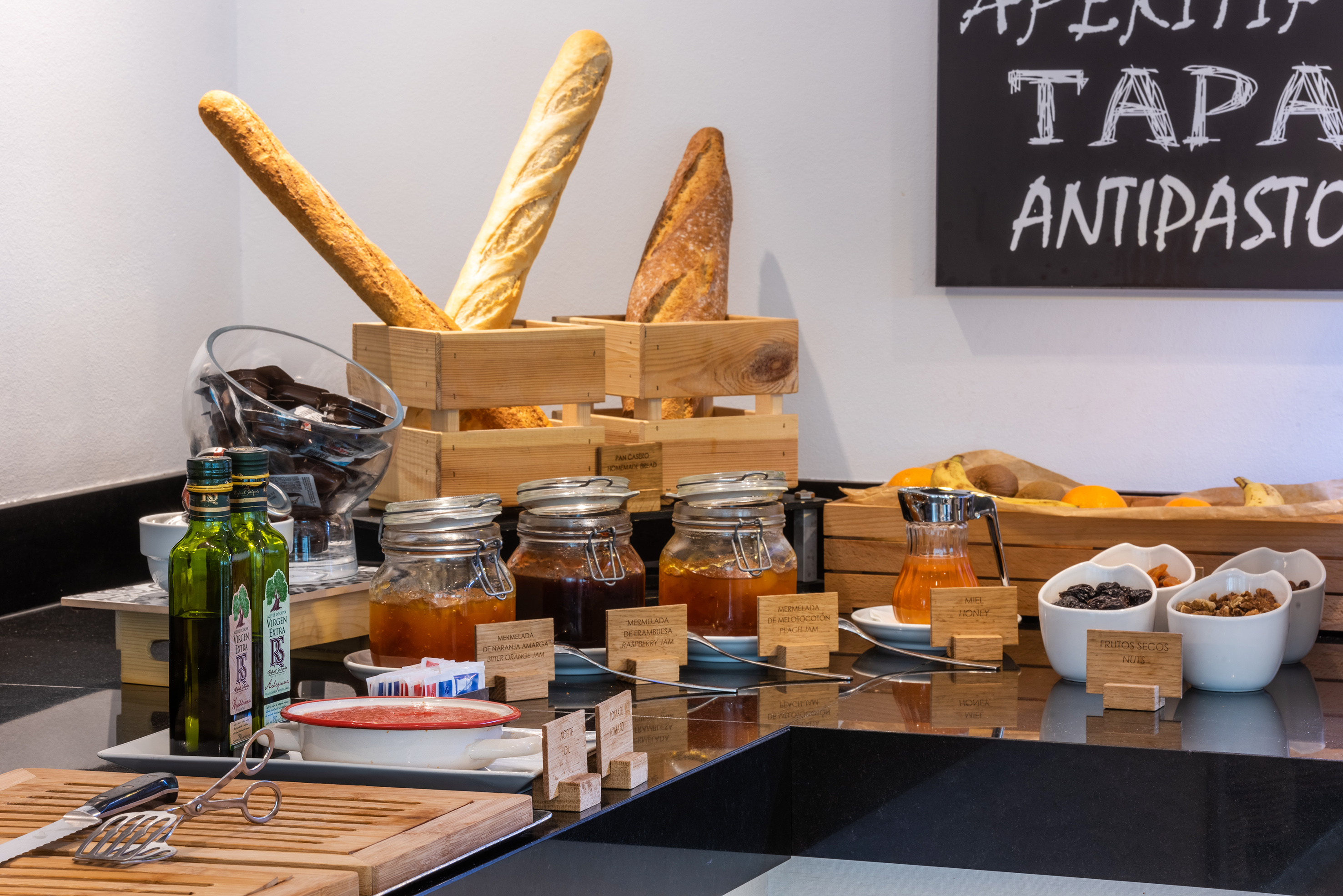 a counter with food and drinks on it