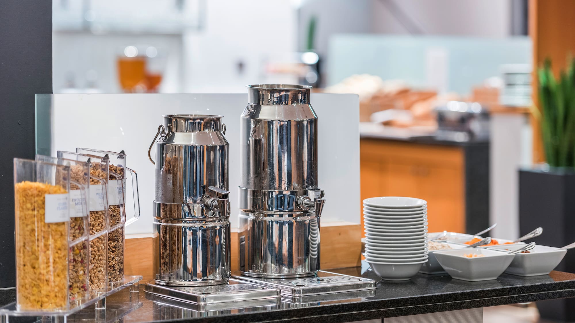 a group of metal containers on a counter