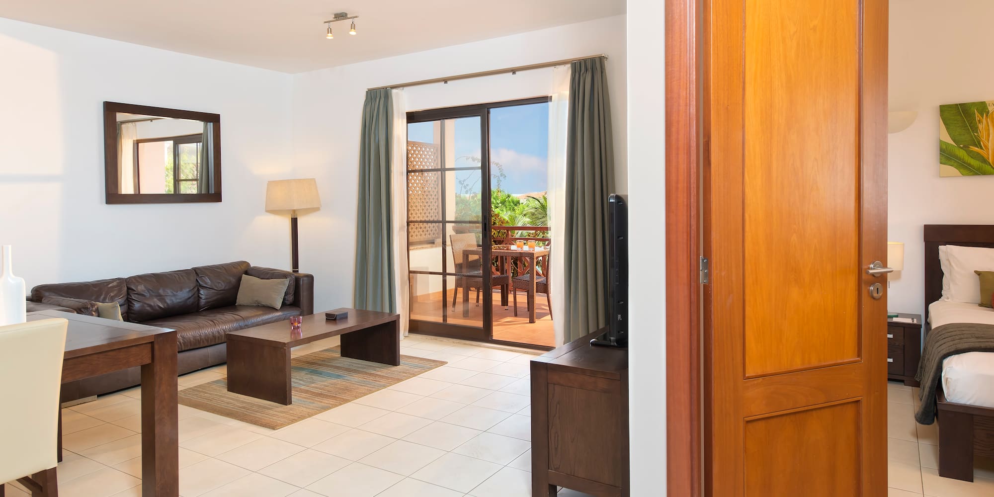 a living room with a couch and a television