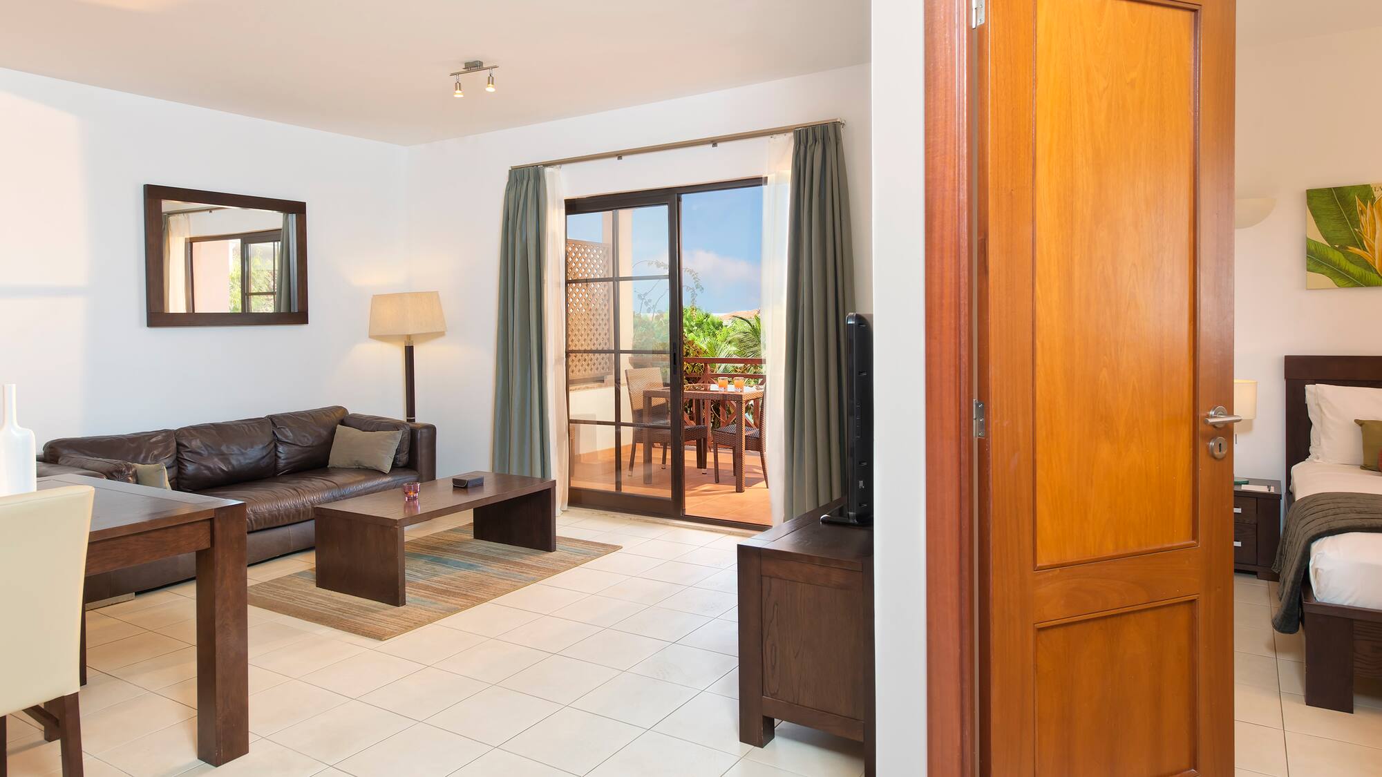 a living room with a couch and a television