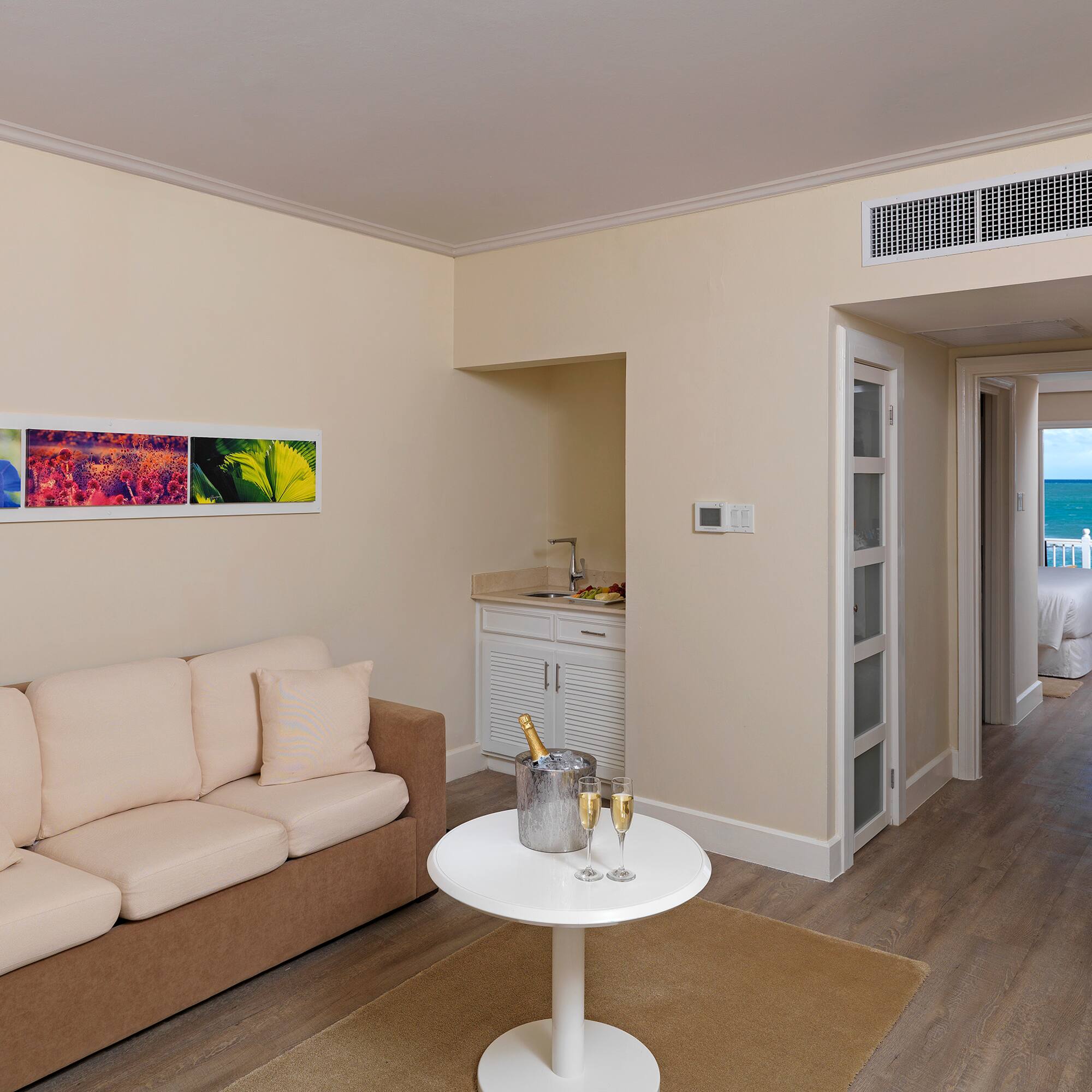 a living room with a couch and a table