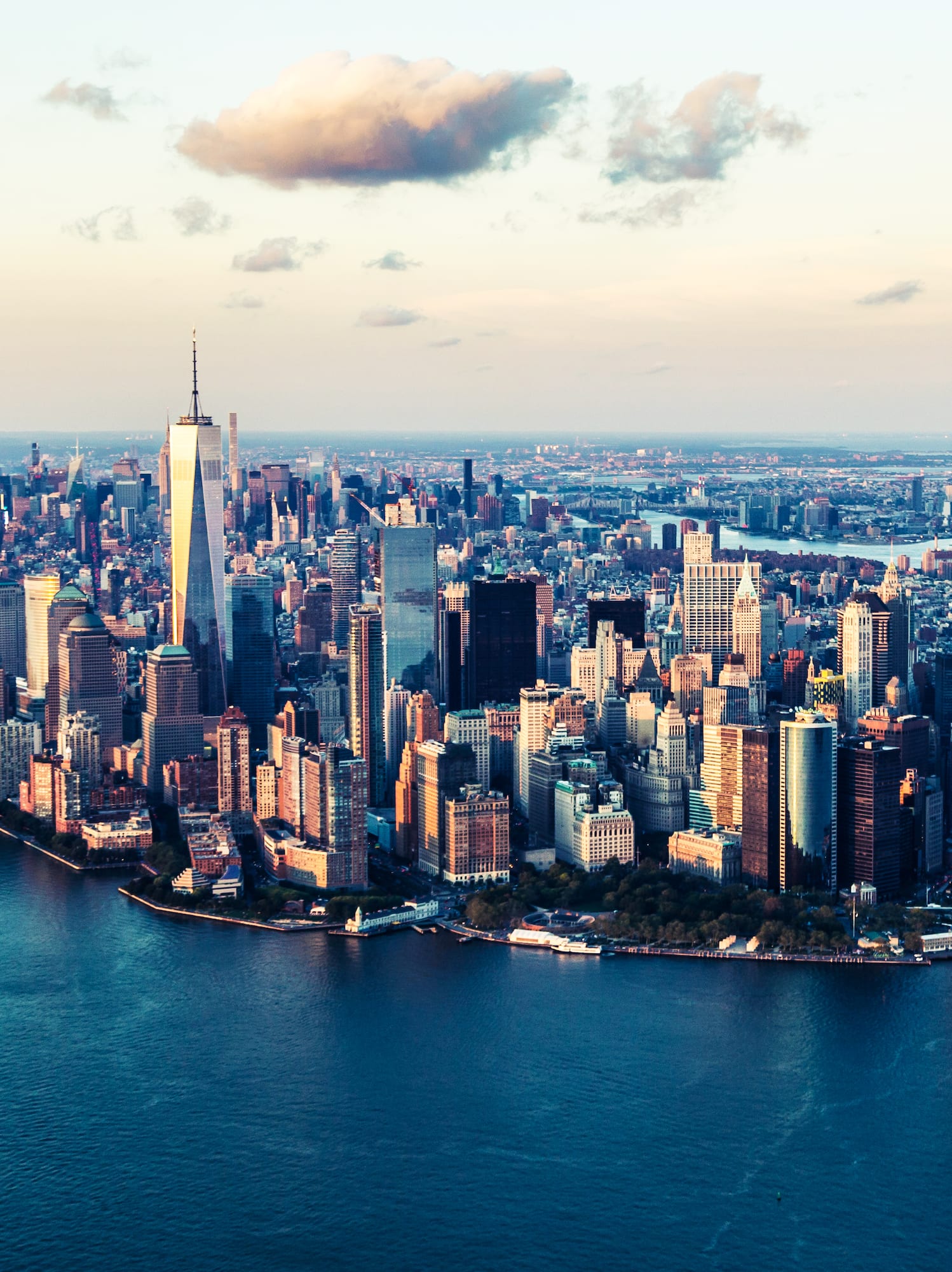 a city with water and clouds