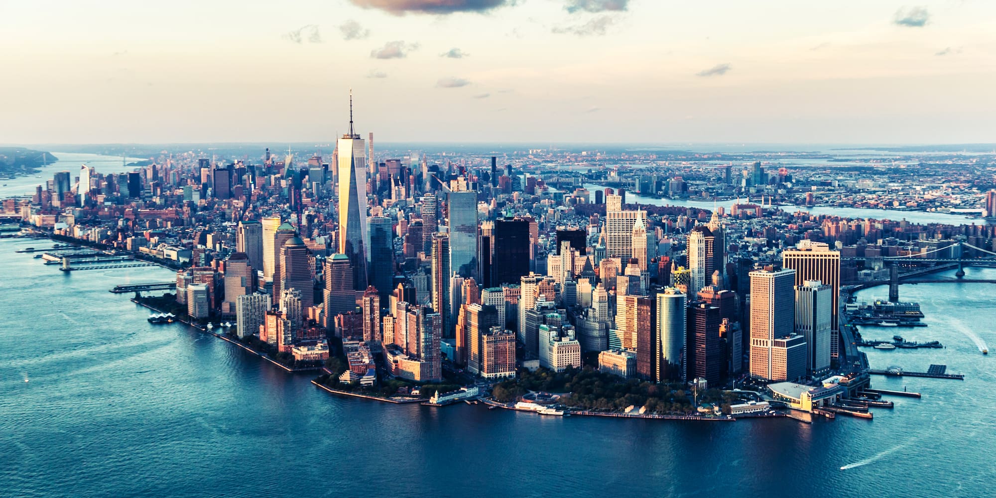 a city with water and clouds