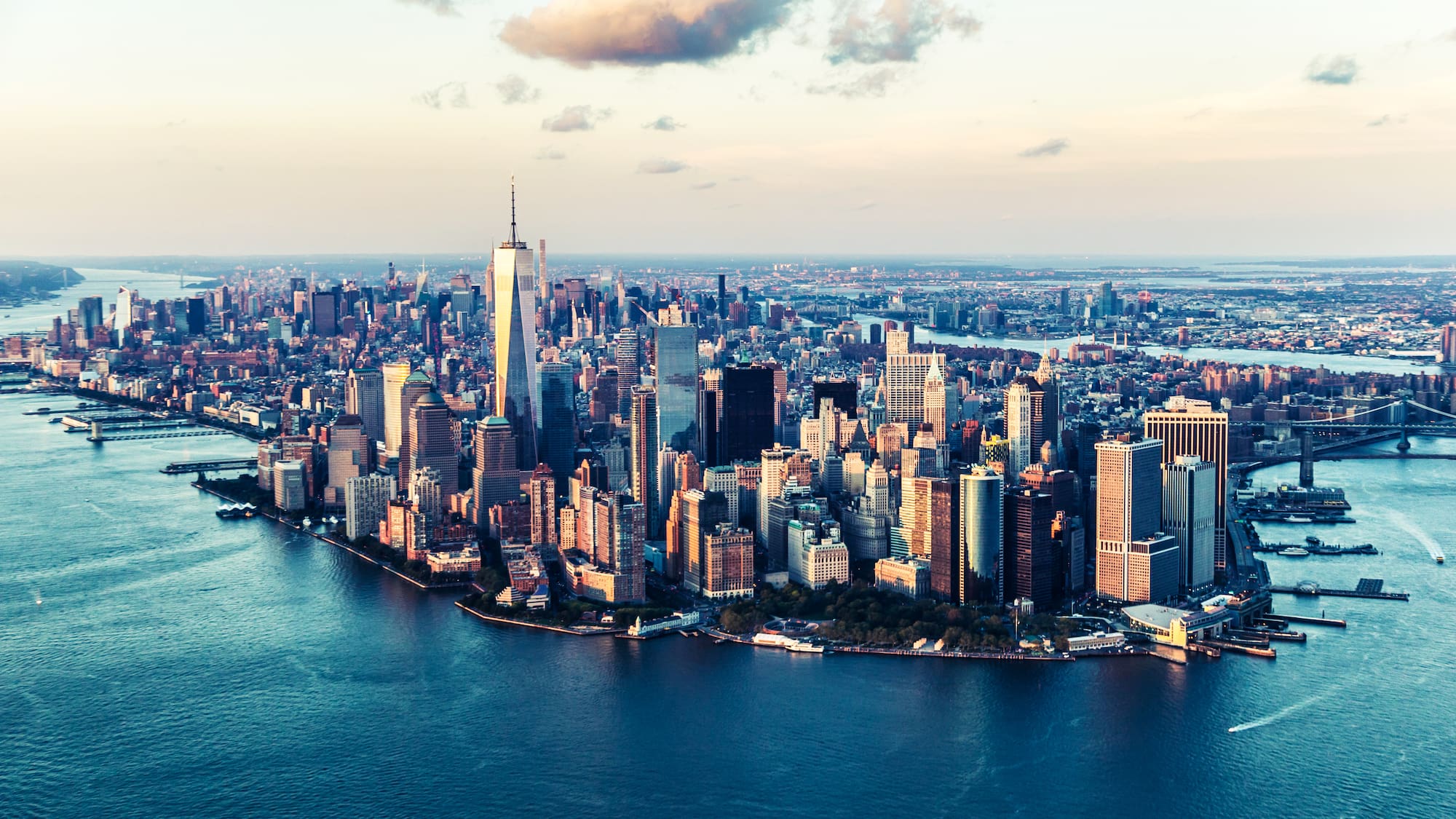 a city with water and clouds