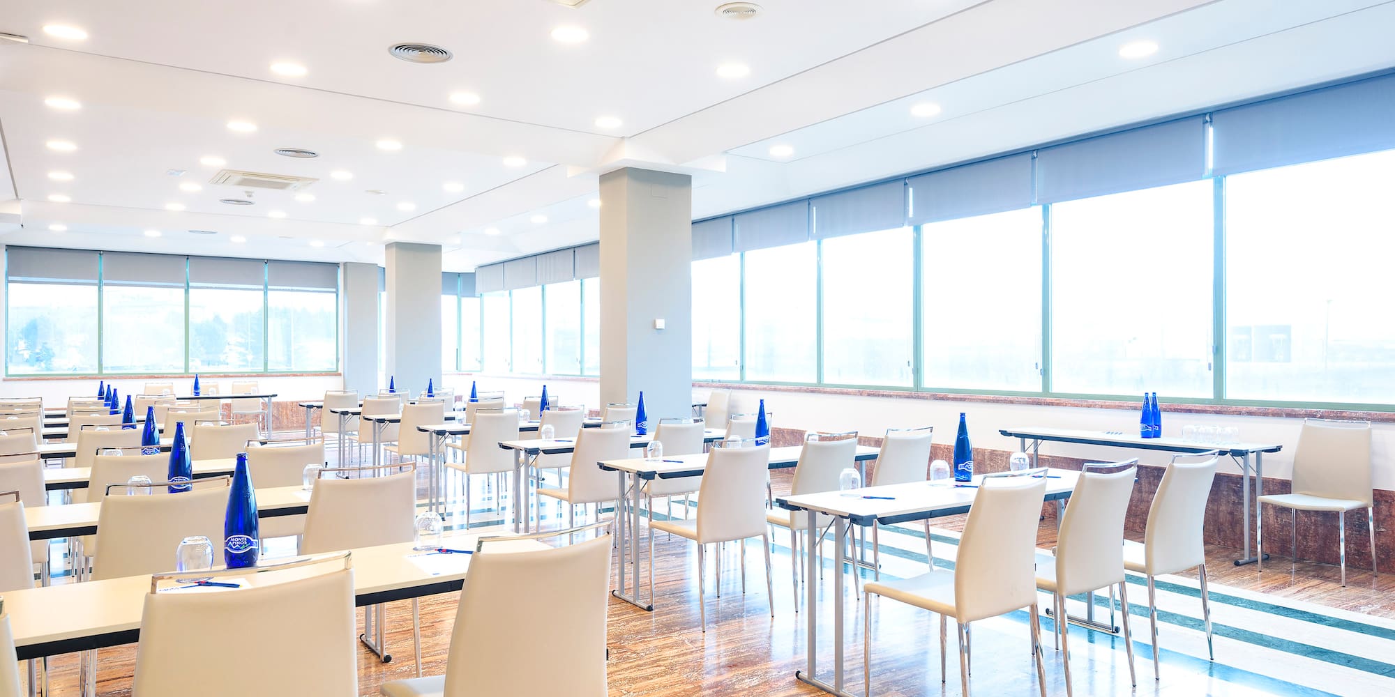 a room with tables and chairs