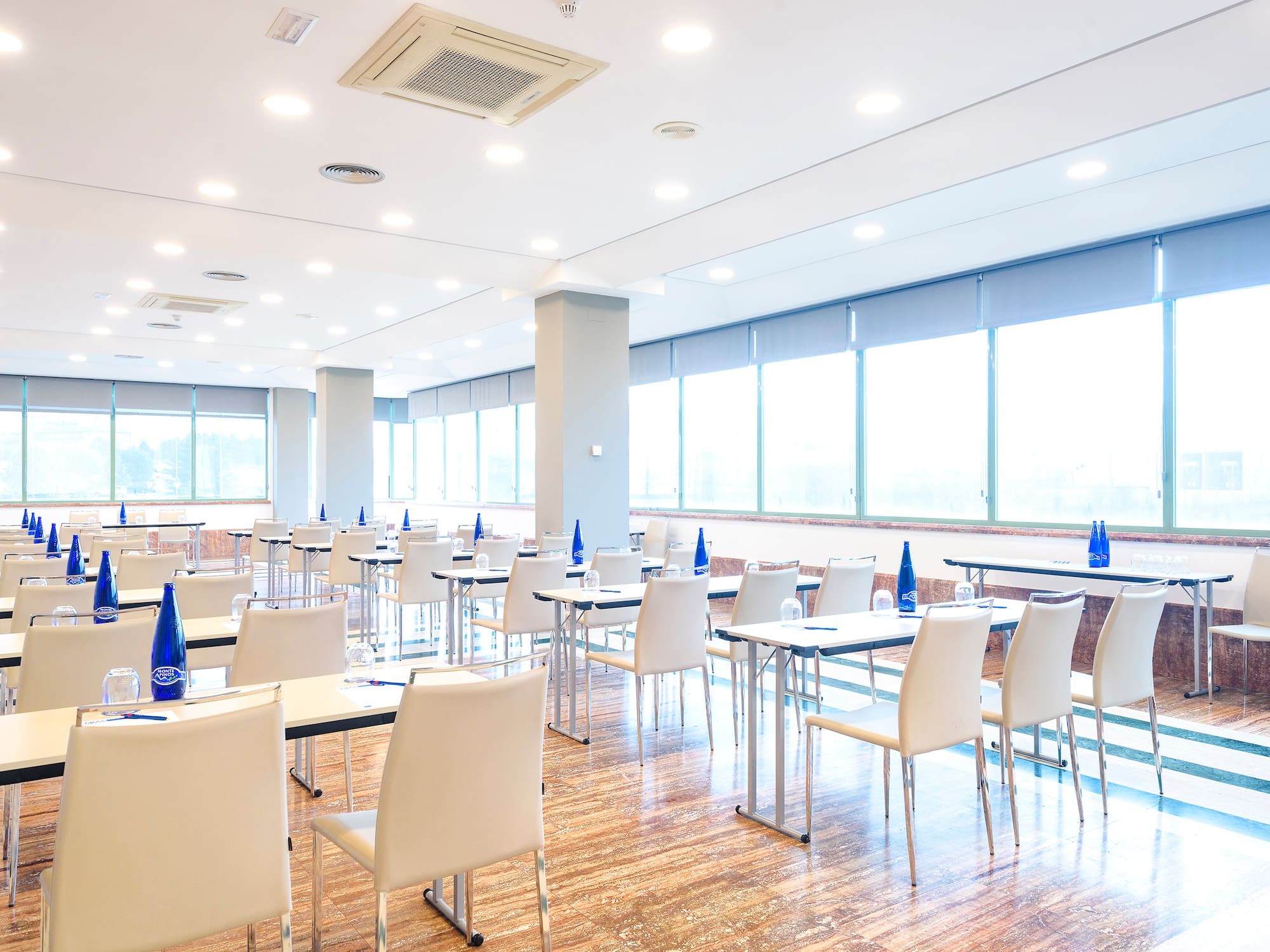 a room with tables and chairs