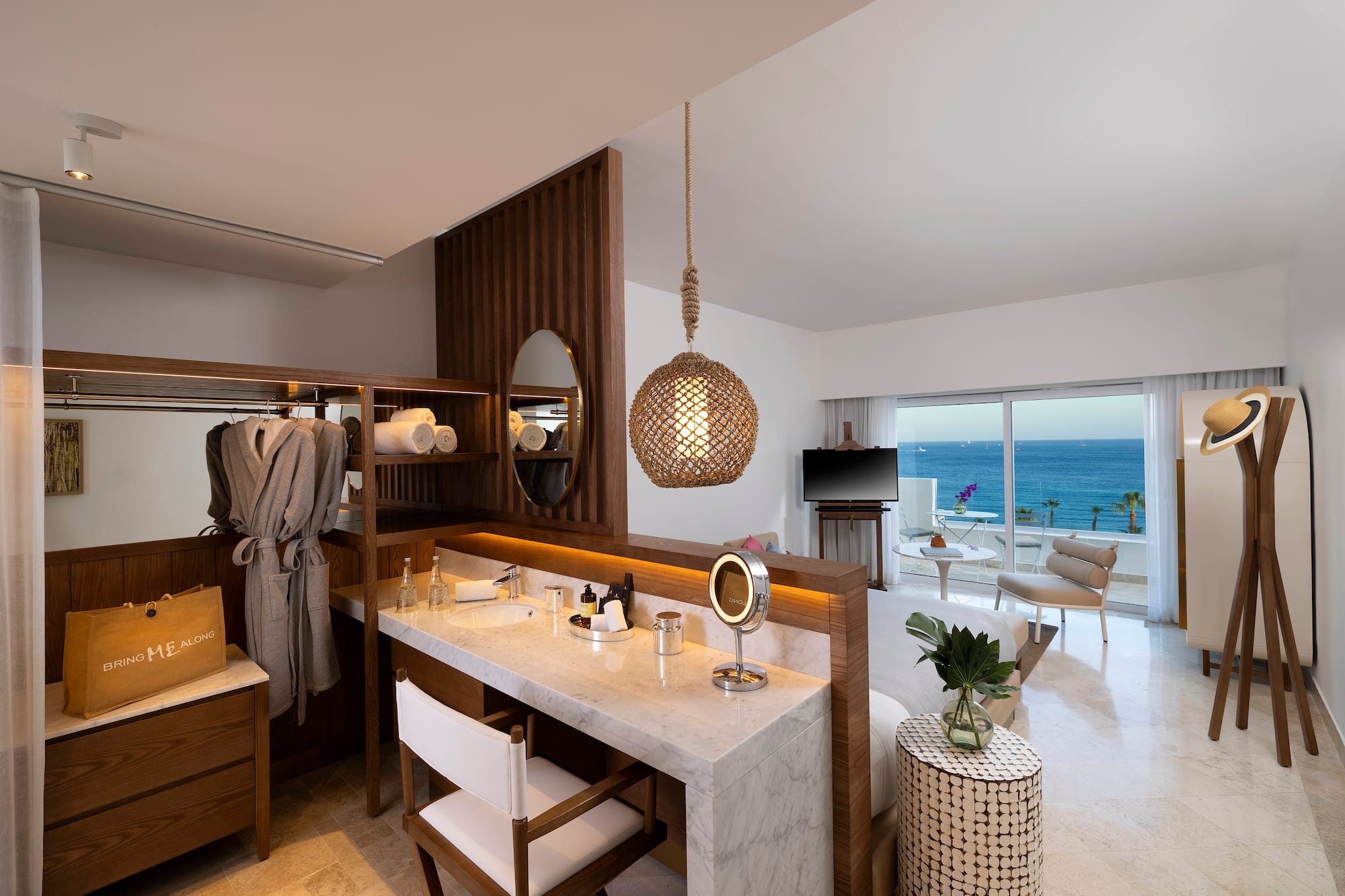 a room with a large mirror and a large table