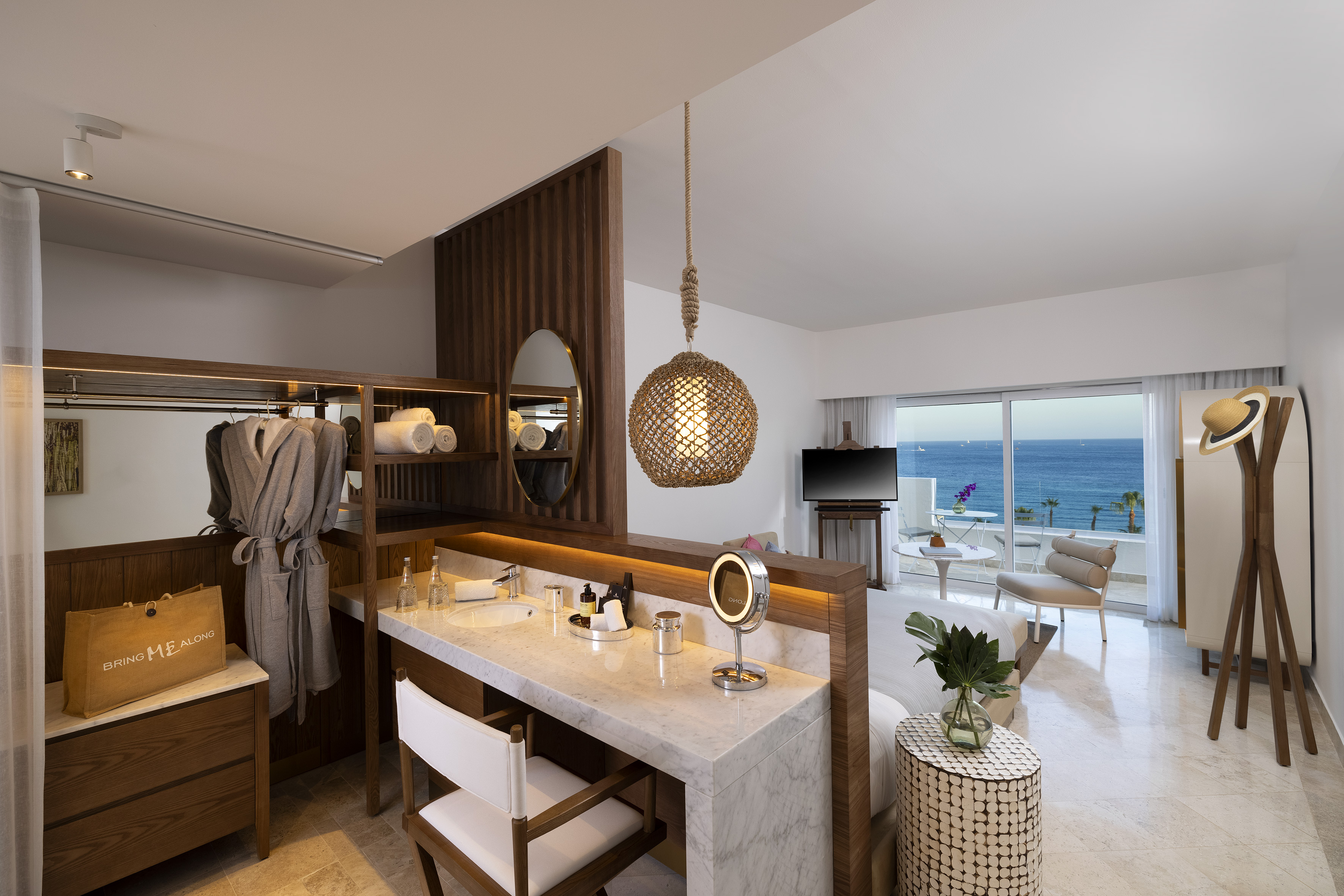 a room with a large mirror and a large table