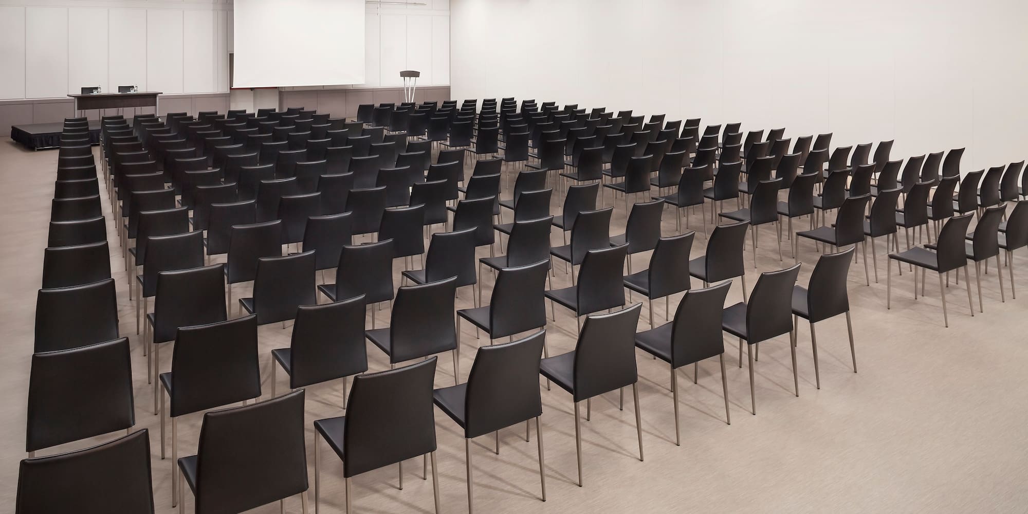 a room with rows of chairs