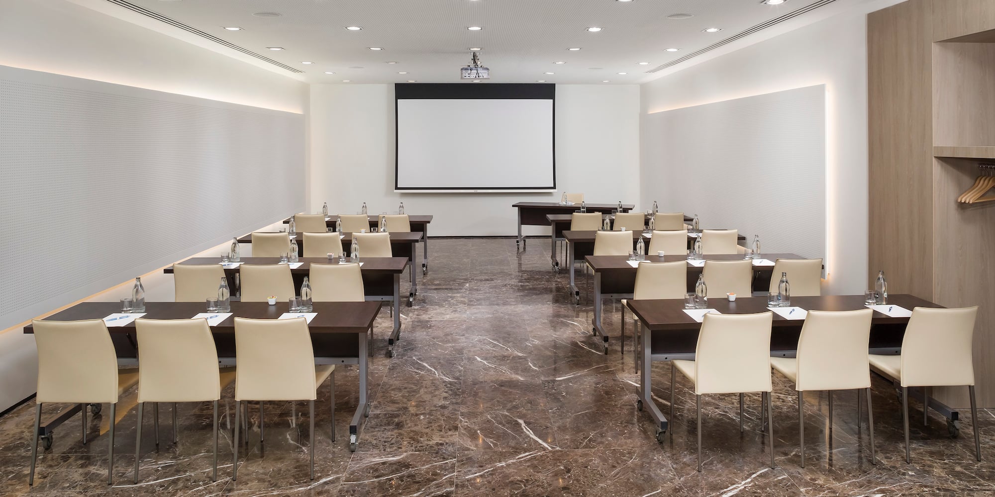 a room with tables and chairs