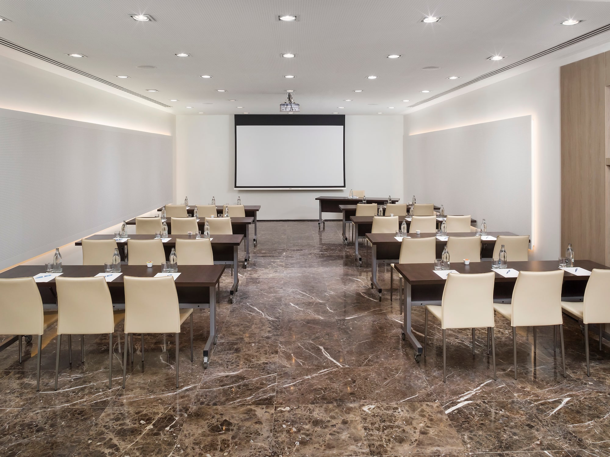 a room with tables and chairs