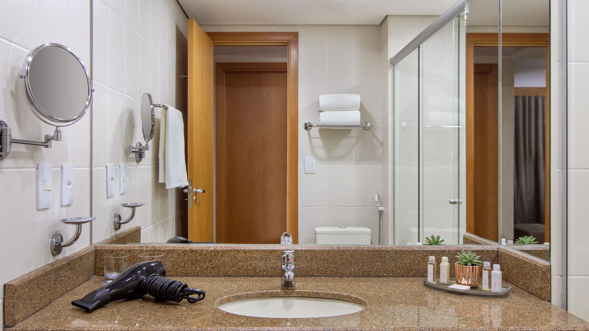 a bathroom with a sink and a shower