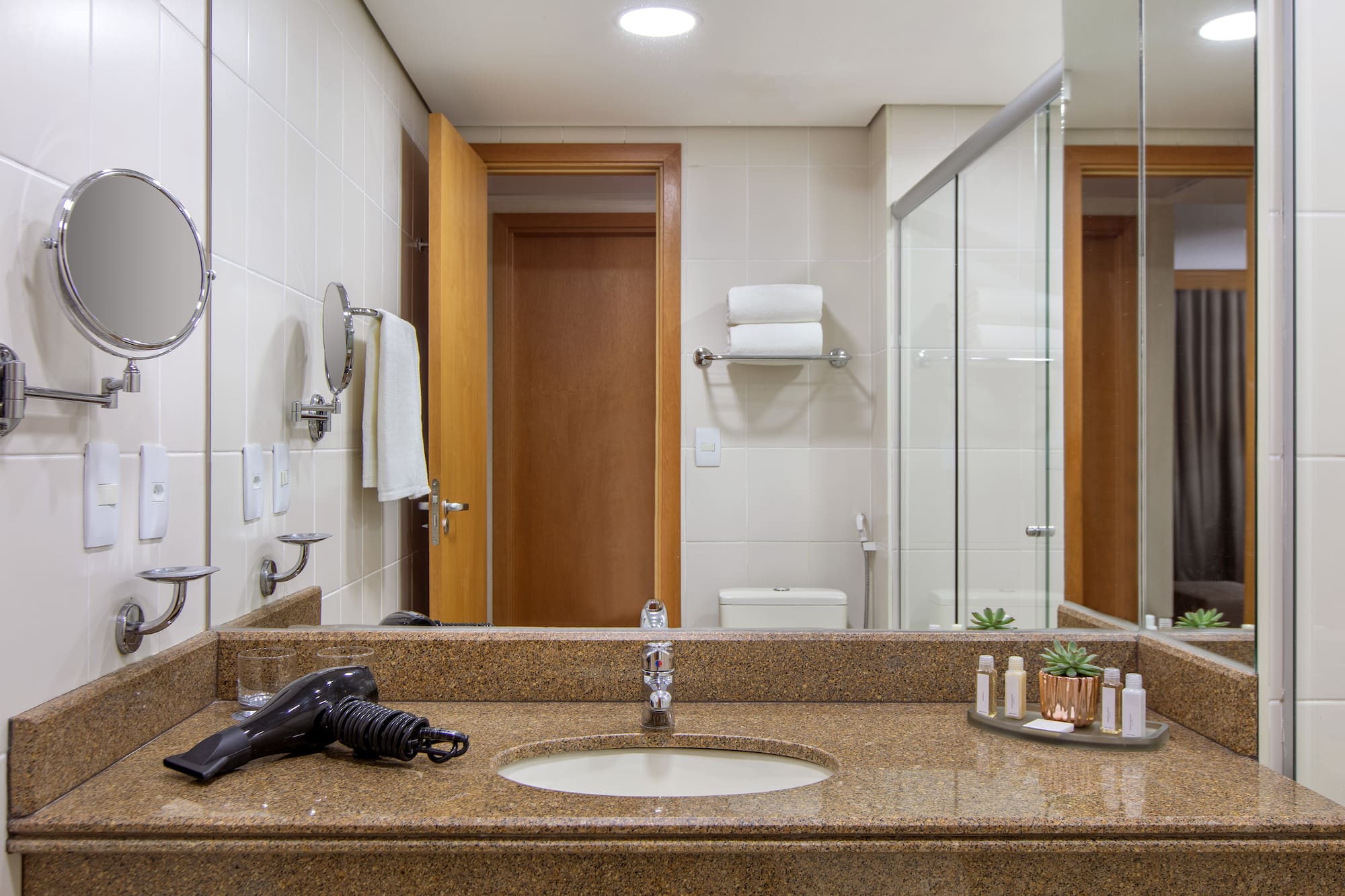 a bathroom with a sink and a shower