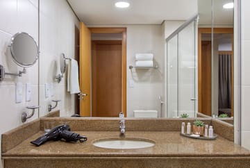 a bathroom with a sink and a shower