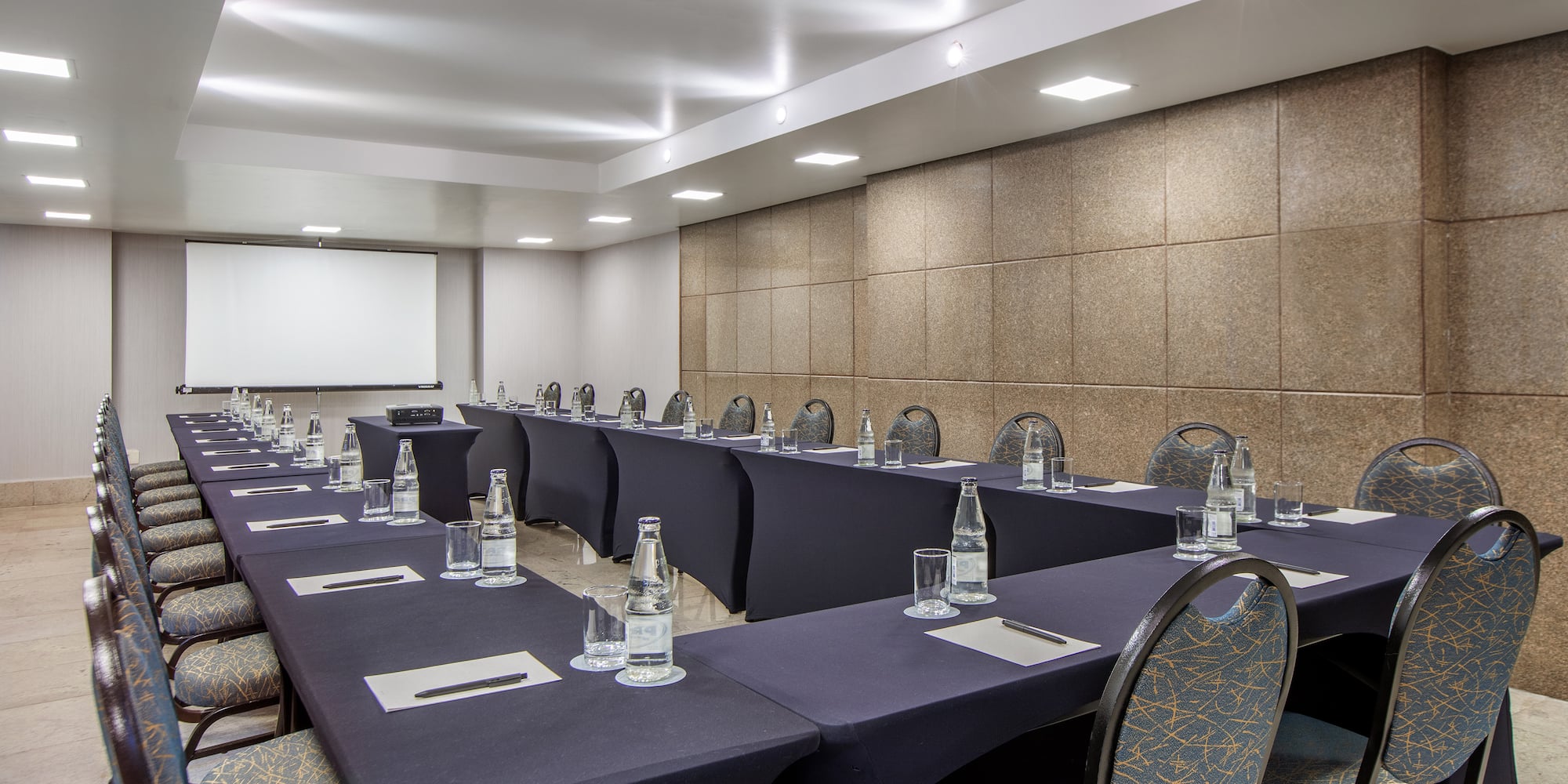 a room with tables and chairs