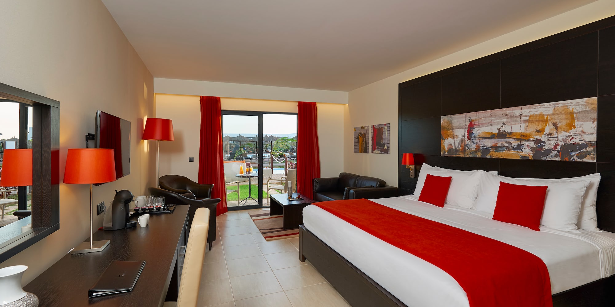 a room with a bed and a desk