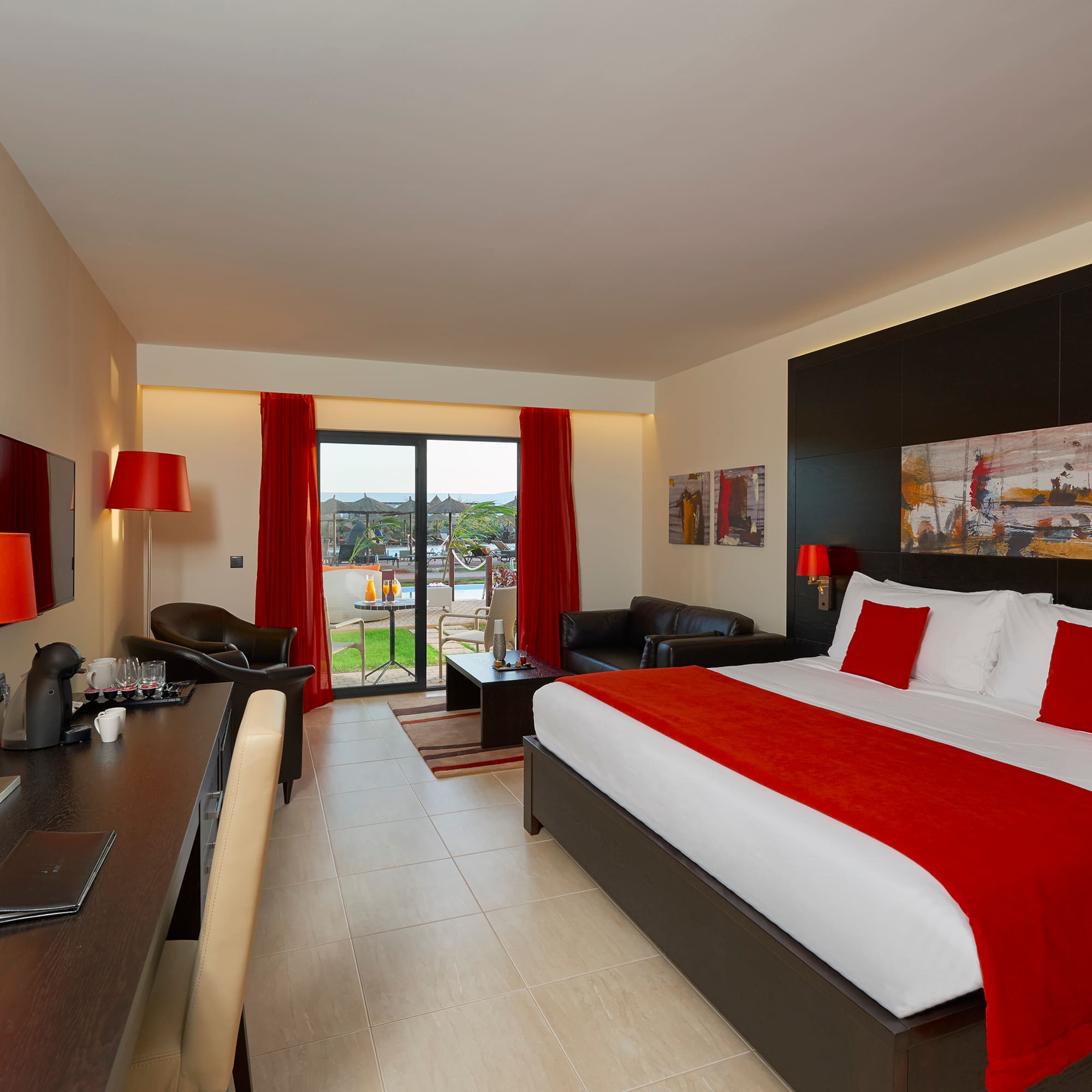 a room with a bed and a desk