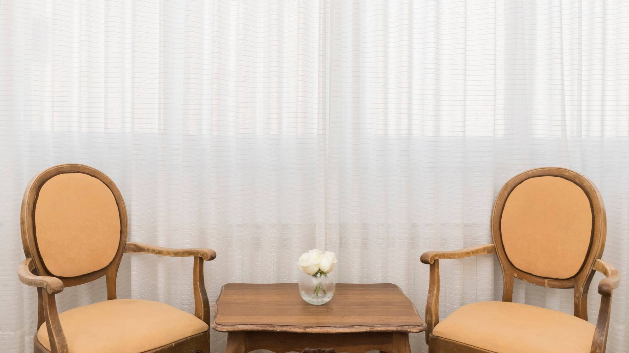 a table and chairs in a room