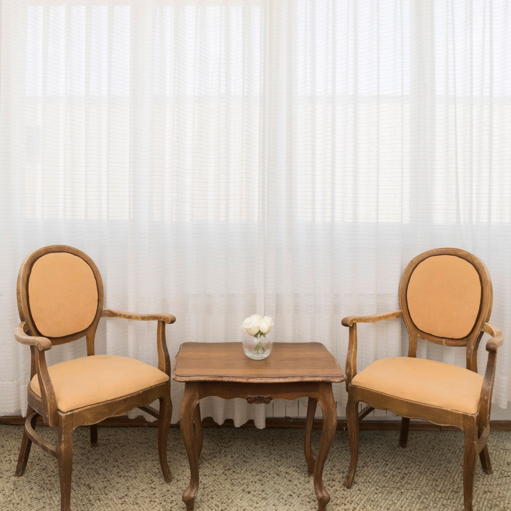 a table and chairs in a room