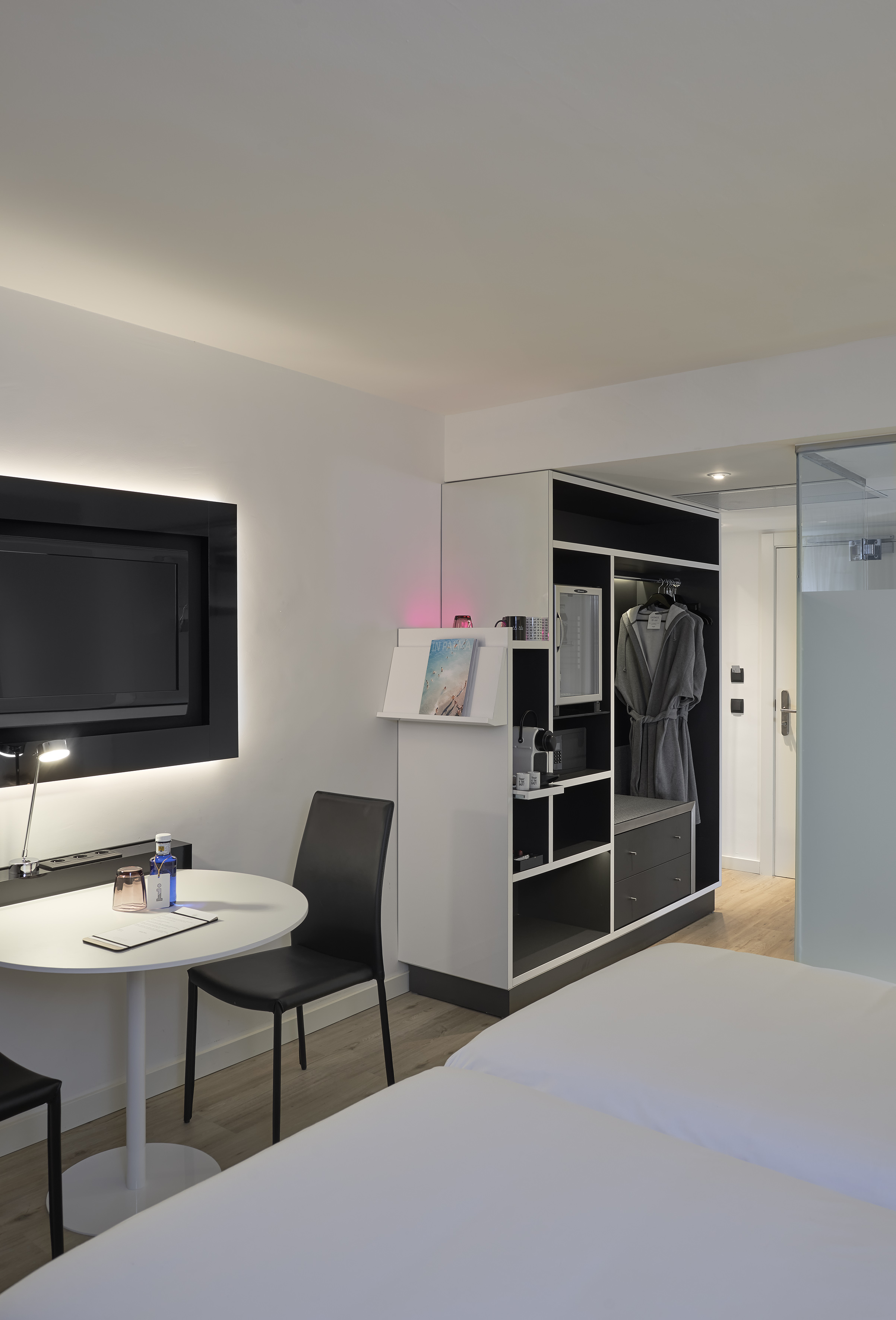 a room with a tv and a table