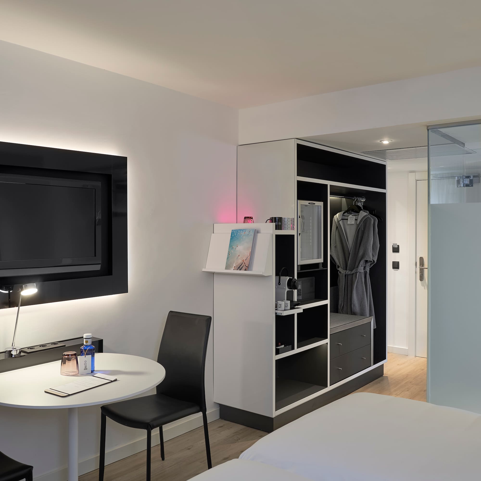 a room with a tv and a table