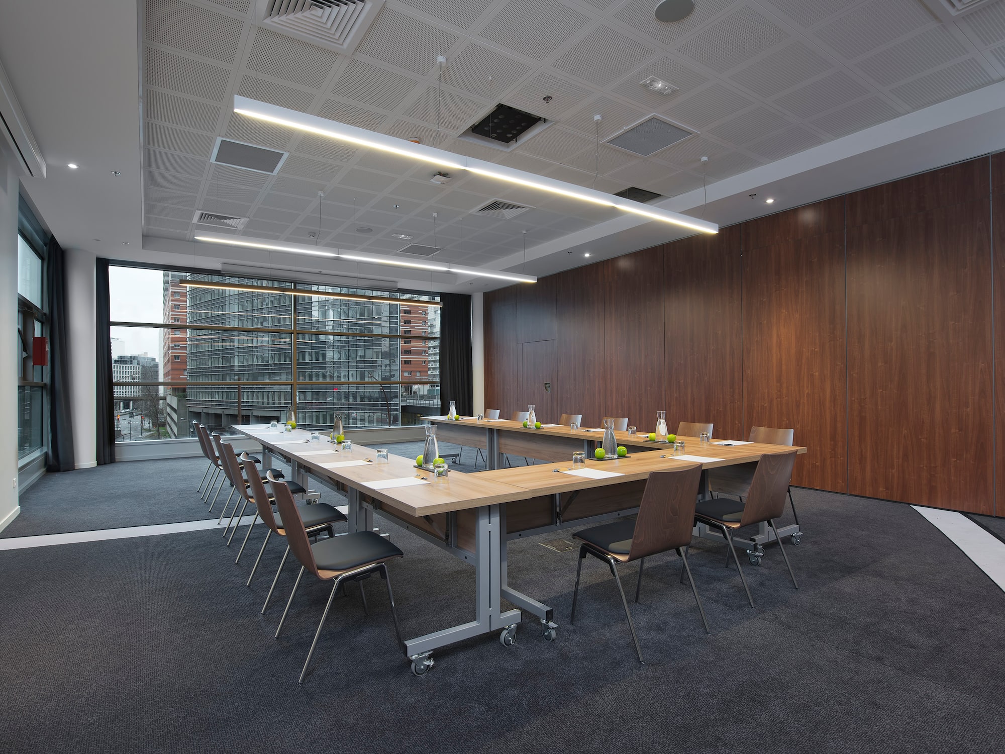 a conference room with a table and chairs
