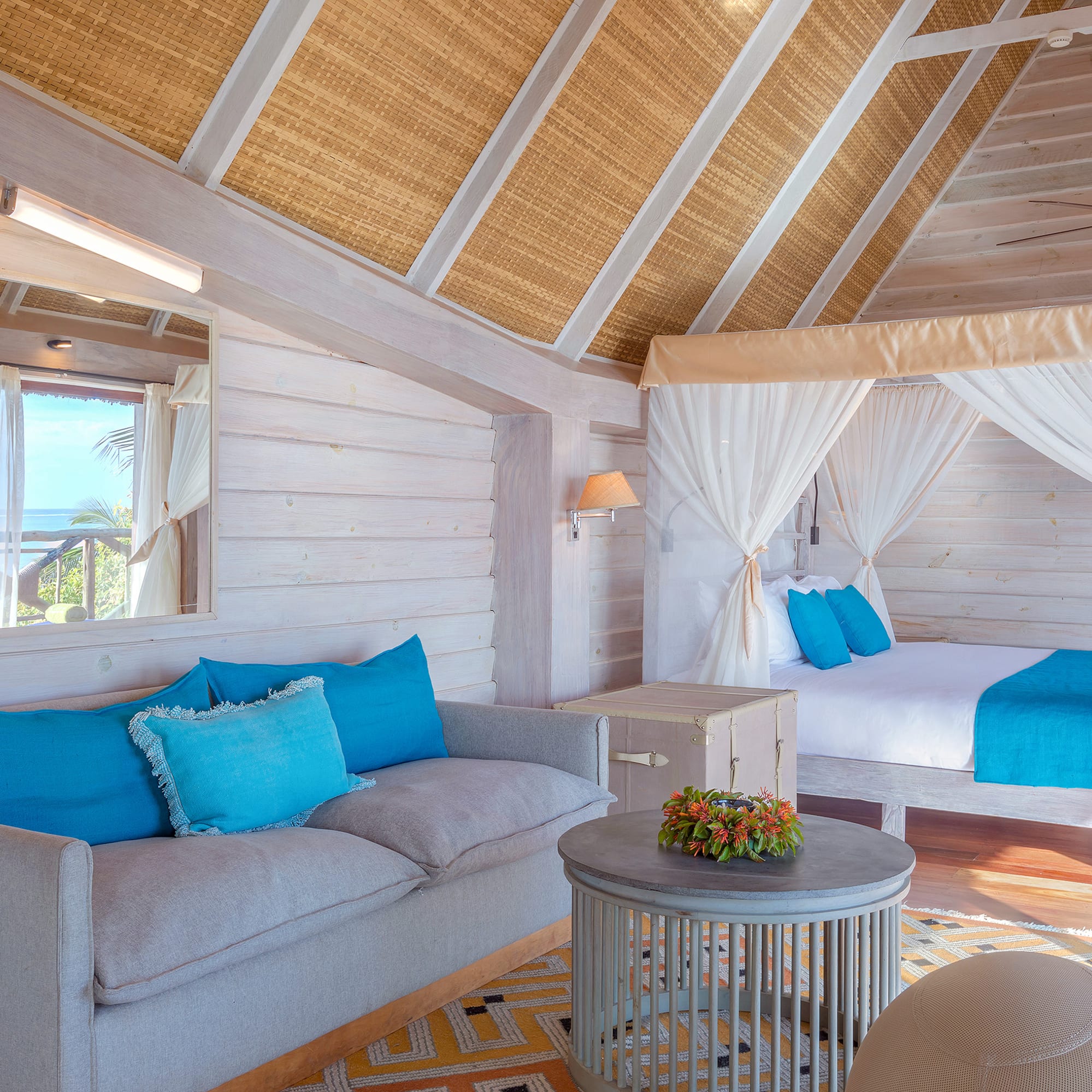 a room with a bed and a couch