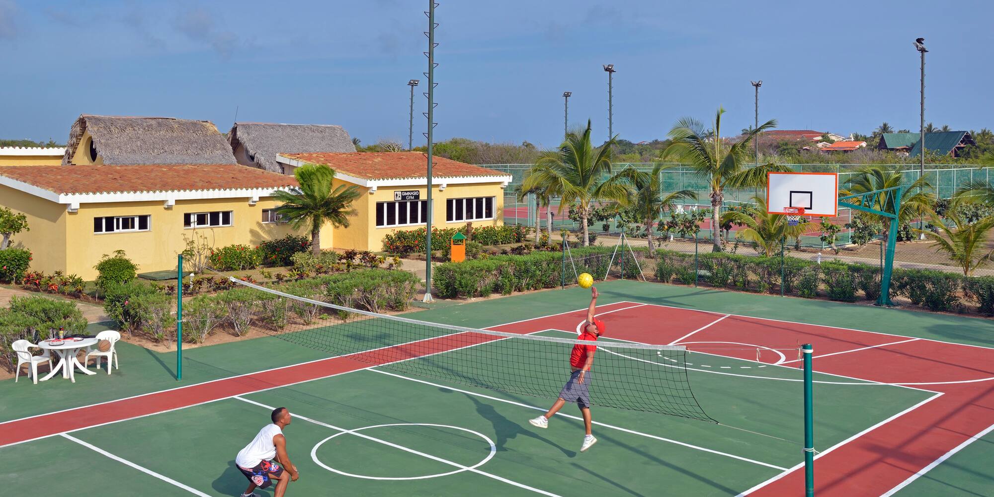 a man playing tennis on a court
