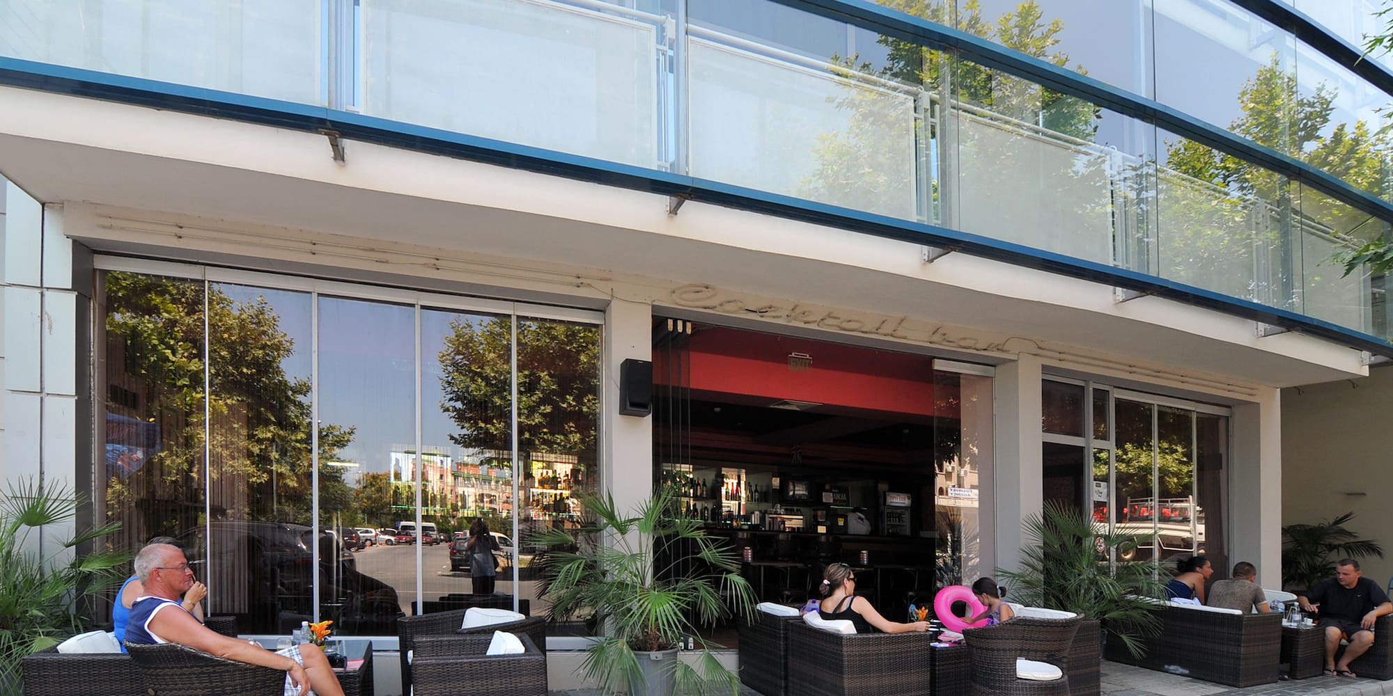 people sitting outside a building
