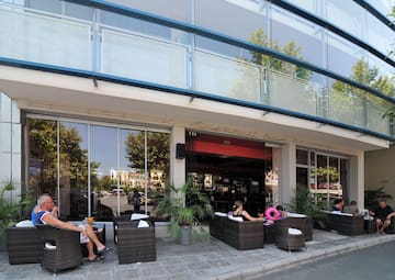 people sitting outside a building