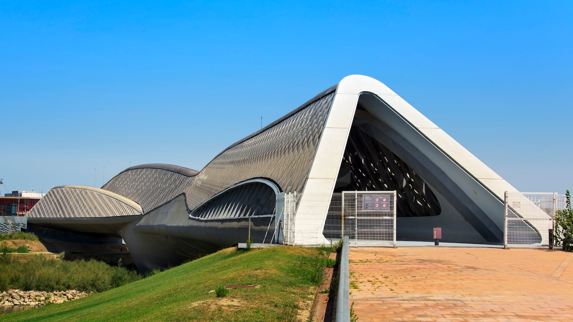 a building with a curved roof
