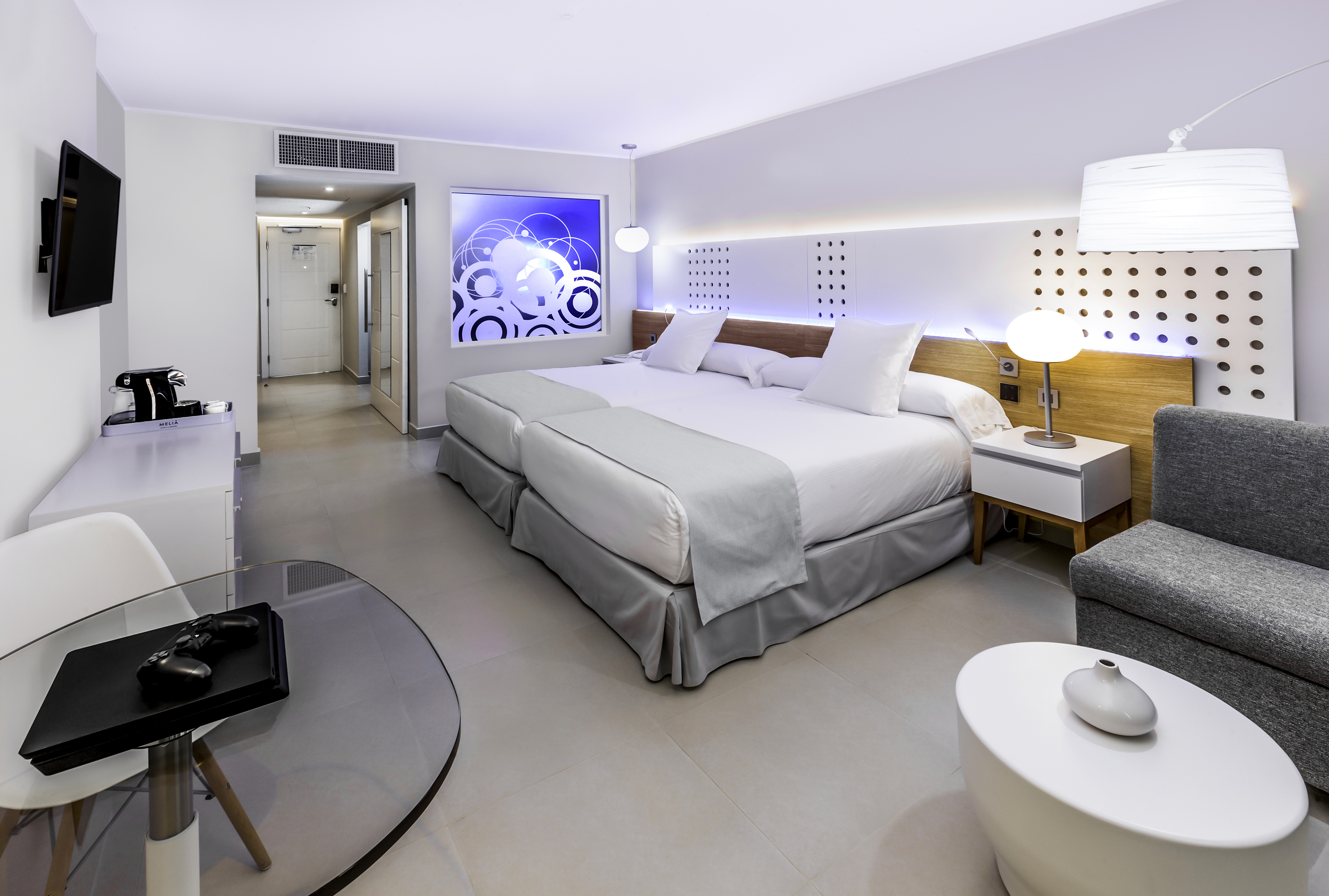 a room with a bed and a table